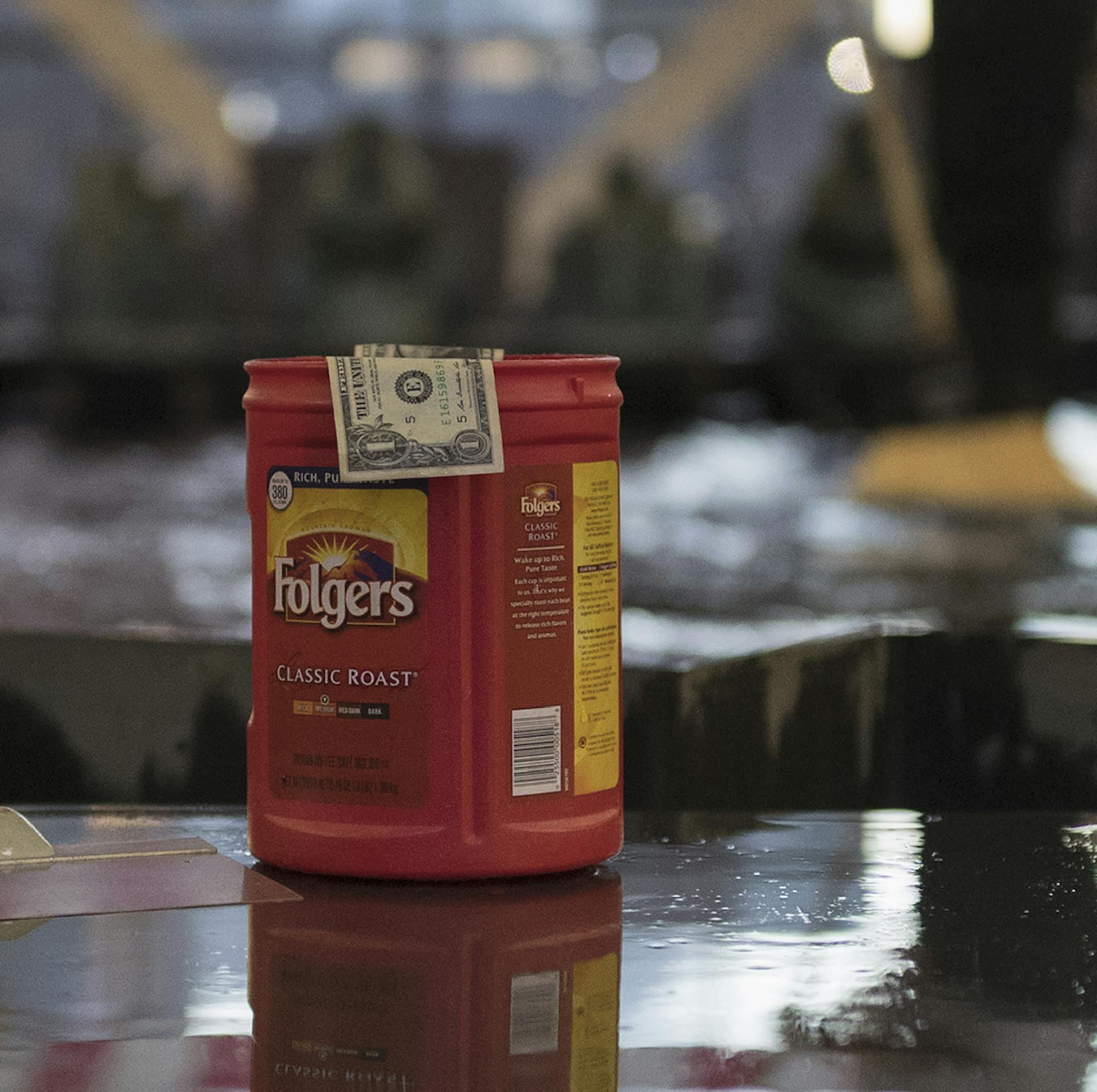 Dave Getten cleaned out the pool at Hennepin County Government Center Tuesday January 3,2017 in Minneapolis , MN.] The pool is cleaned out monthly and money that is collect is donate to a Minneapolis homeless support nonprofit. Over the years, thousands of dollars has gone to local charities as a result of the pool. Jerry Holt / jerry. Holt@Startribune.com