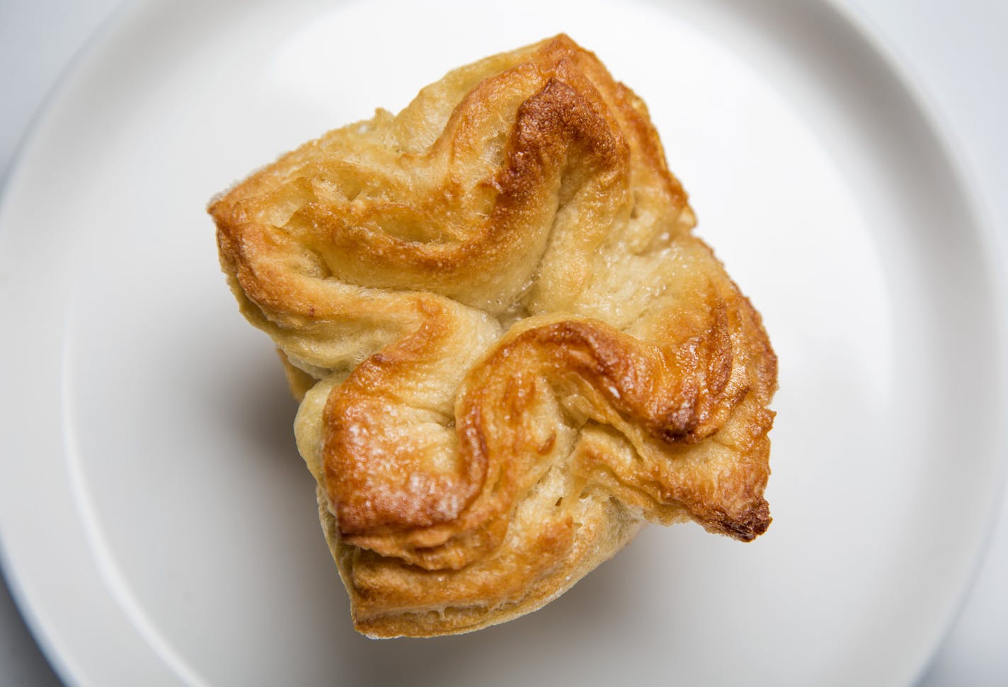Kouign amann is a pastry that seems like it takes a lot of steps to make -- but it's really just one step done several times.
