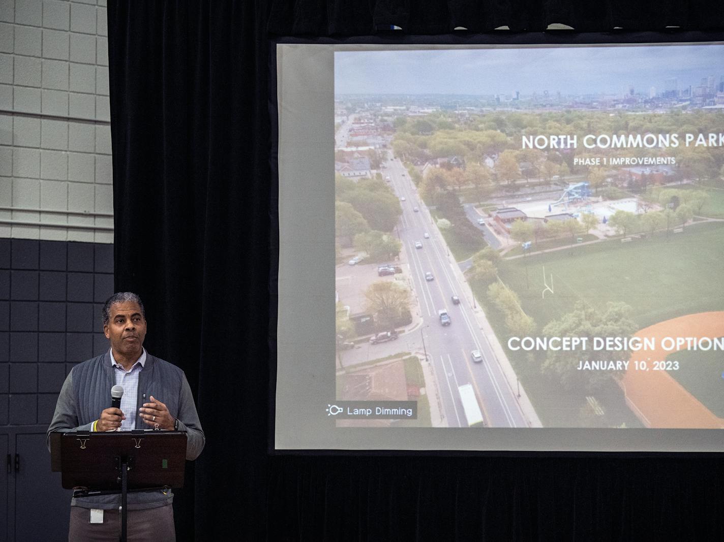 Minneapolis Parks and Recreation Board Superintendent Al Bangoura chats with community members about North Commons Park renovation plans in Minneapolis, Minn., on Tuesday, Jan. 10, 2023. Initial concept plans for transforming North Commons Park facilities into a Northside hub for arts, recreation, athletics and a host of community activities are unveiled. ] RICHARD TSONG-TAATARII • richard.tsong-taatarii @startribune.com