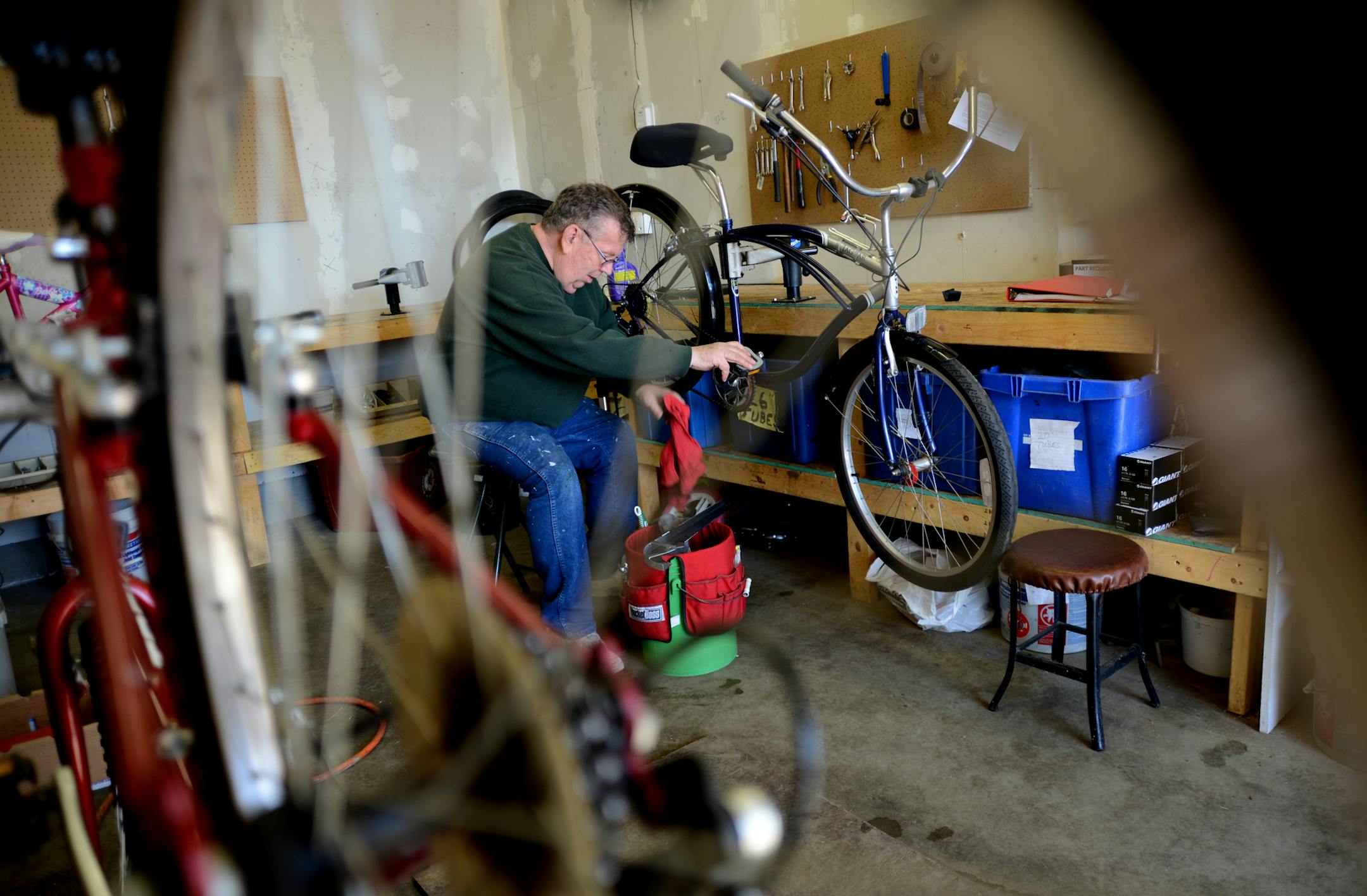 Robert and Wilma Burbach Foundation Bike Foundation, is an all volunteer group in Ham Lake that fixes up old bikes destined for the scrap heap and gives them to needy kids. They're gearing up for summer. Last year they fixed up and gave away 200 bikes. This year, they're aiming for 300. Ken Irvin of Ham Lake, worked repairing a Schwinn bike. Typically each bike is worked on for about 3 hours cleaning, checking bakes, fixing gears and replacing tires ] Richard.Sennott@startribune.com Richard Senn