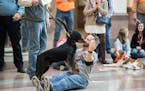 Austin Kaus got a surprise kiss from a dog as he did a live stream for South Dakota Tourism of the "Dog Parade'' that kicked off the Pheasant Fest and