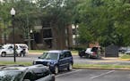 Authorities respond to the scene Randallstown, Md., Monday, Aug. 1, 2016. Baltimore County police say officers have shot and killed a woman who barric