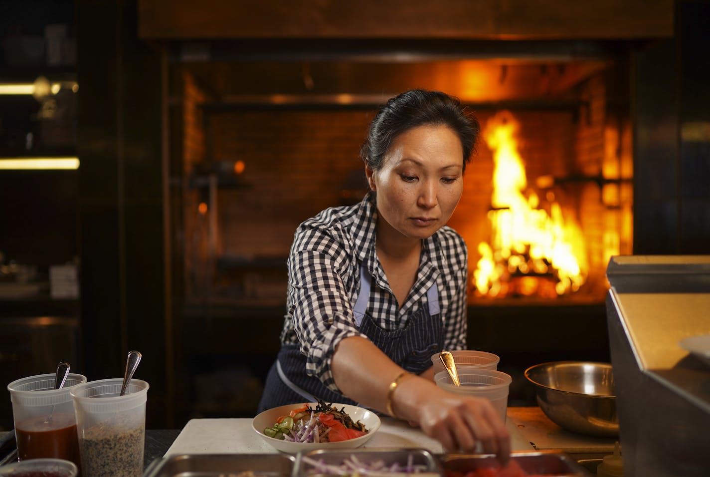 Ann Kim prepared a Bibim Grain salad at Young Joni in northeast Minneapolis.