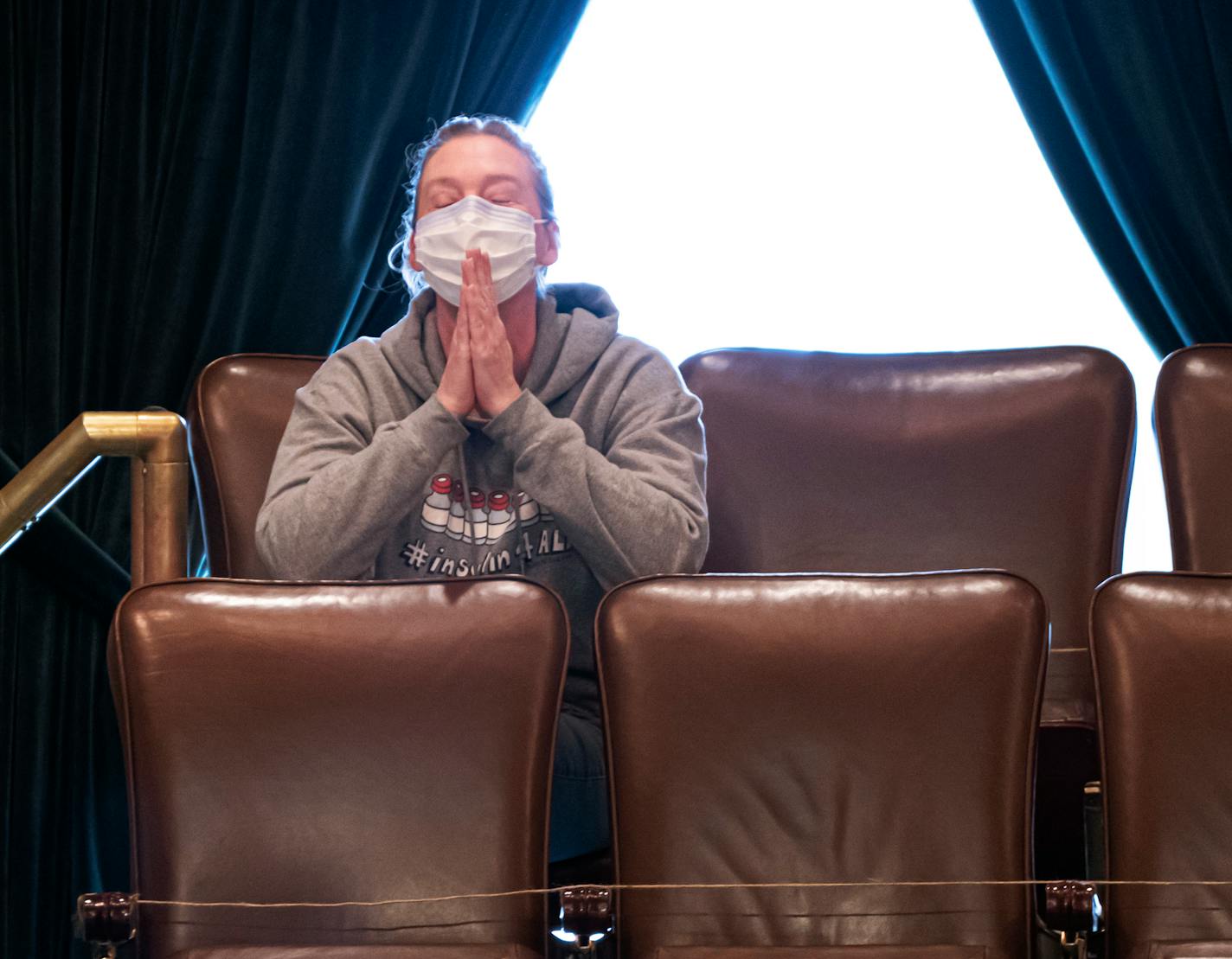 Nicole Smith-Holt reacted from the gallery during the insulin affordability vote in the Minnesota House on Tuesday.