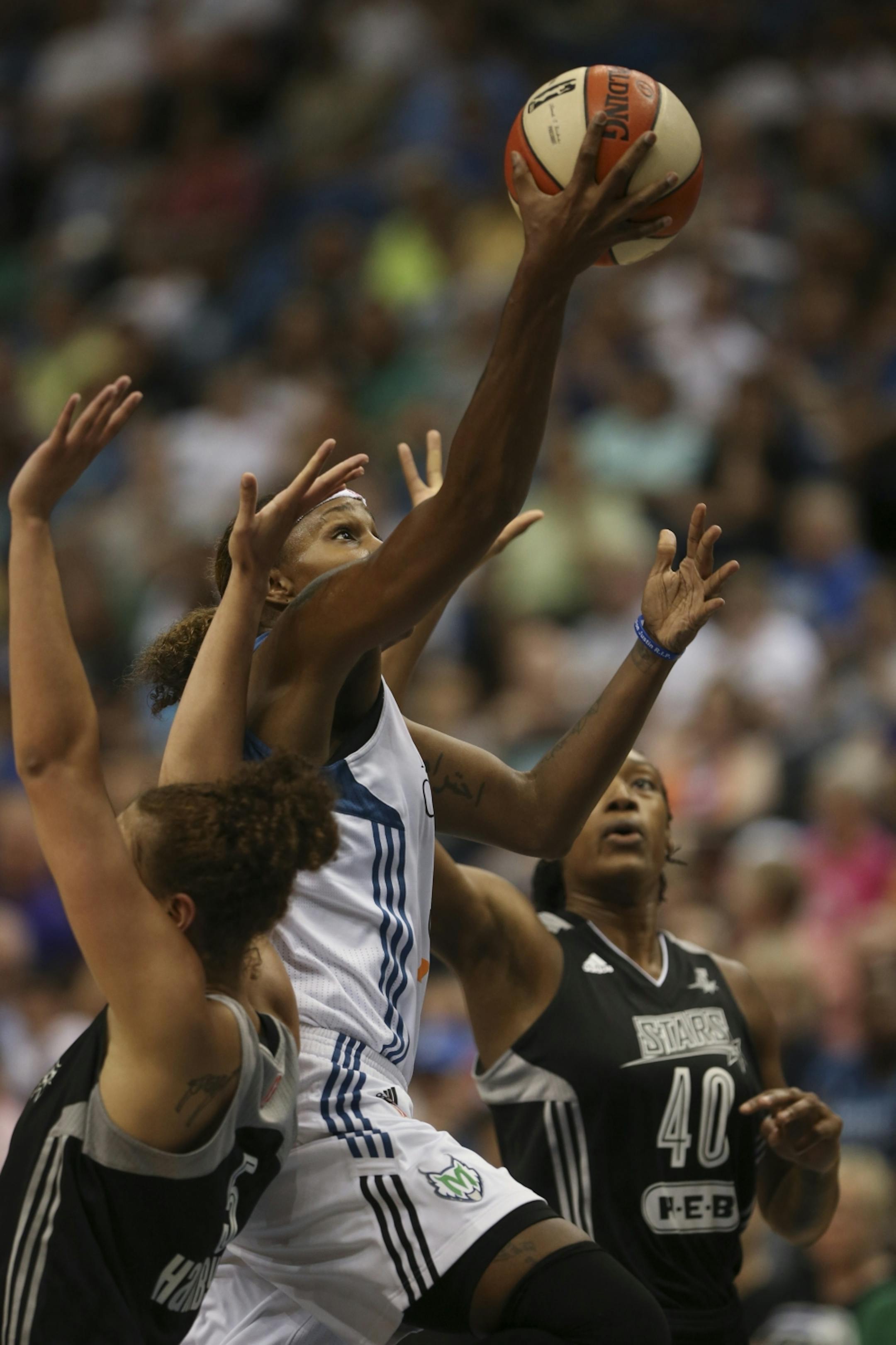 Rebecca Brunson of the Lynx went up for a first quarter basket Sunday night at Target Center. JEFF WHEELER � jeff.wheeler@startribune.com The Minnesota Lynx met the San Antonio Stars in an WNBA game Sunday night, July 12, 2015 at Target Center in Minneapolis.