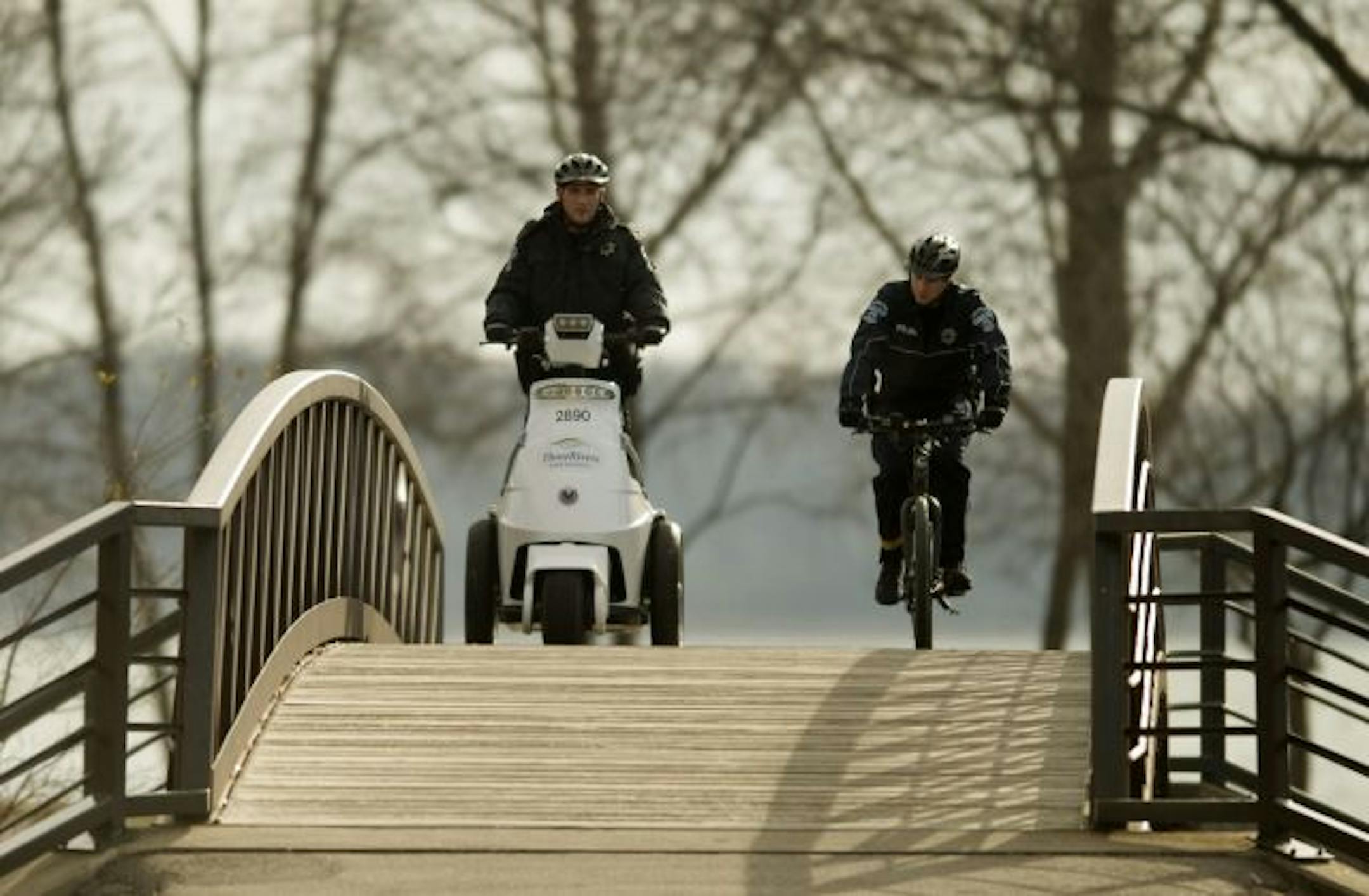 Three Rivers Park Police officers Troy Okerlund and Danny McCullough patrol a section of French Lake Regional Park.