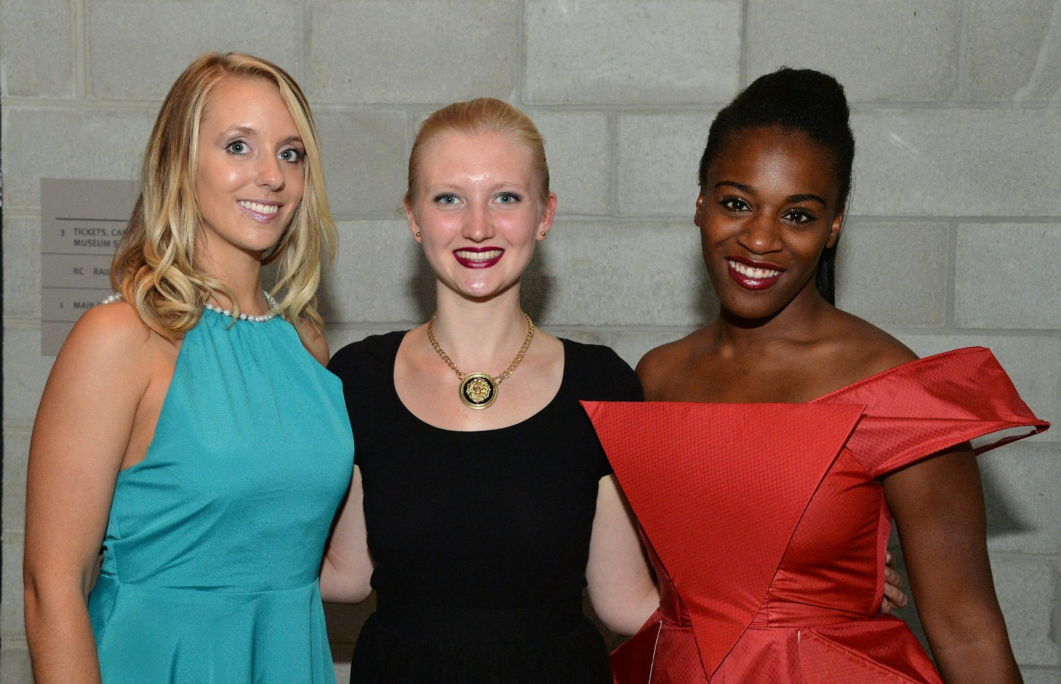 Featured University of Minnesota student designer Marissa Lynch, center, and models Ashley Bergheys, left, and Renae Prater.