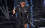 Mahershala Ali accepts the award for best actor in a supporting role for "Moonlight" at the Oscars on Sunday, Feb. 26, 2017, at the Dolby Theatre in L