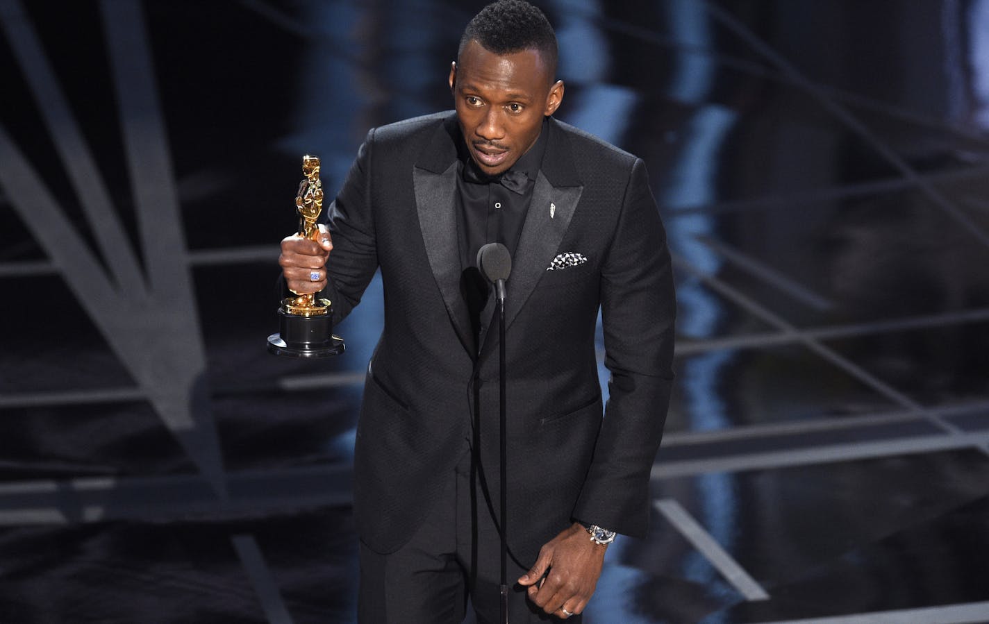 Mahershala Ali accepts the award for best actor in a supporting role for "Moonlight" at the Oscars on Sunday, Feb. 26, 2017, at the Dolby Theatre in Los Angeles. (Photo by Chris Pizzello/Invision/AP)