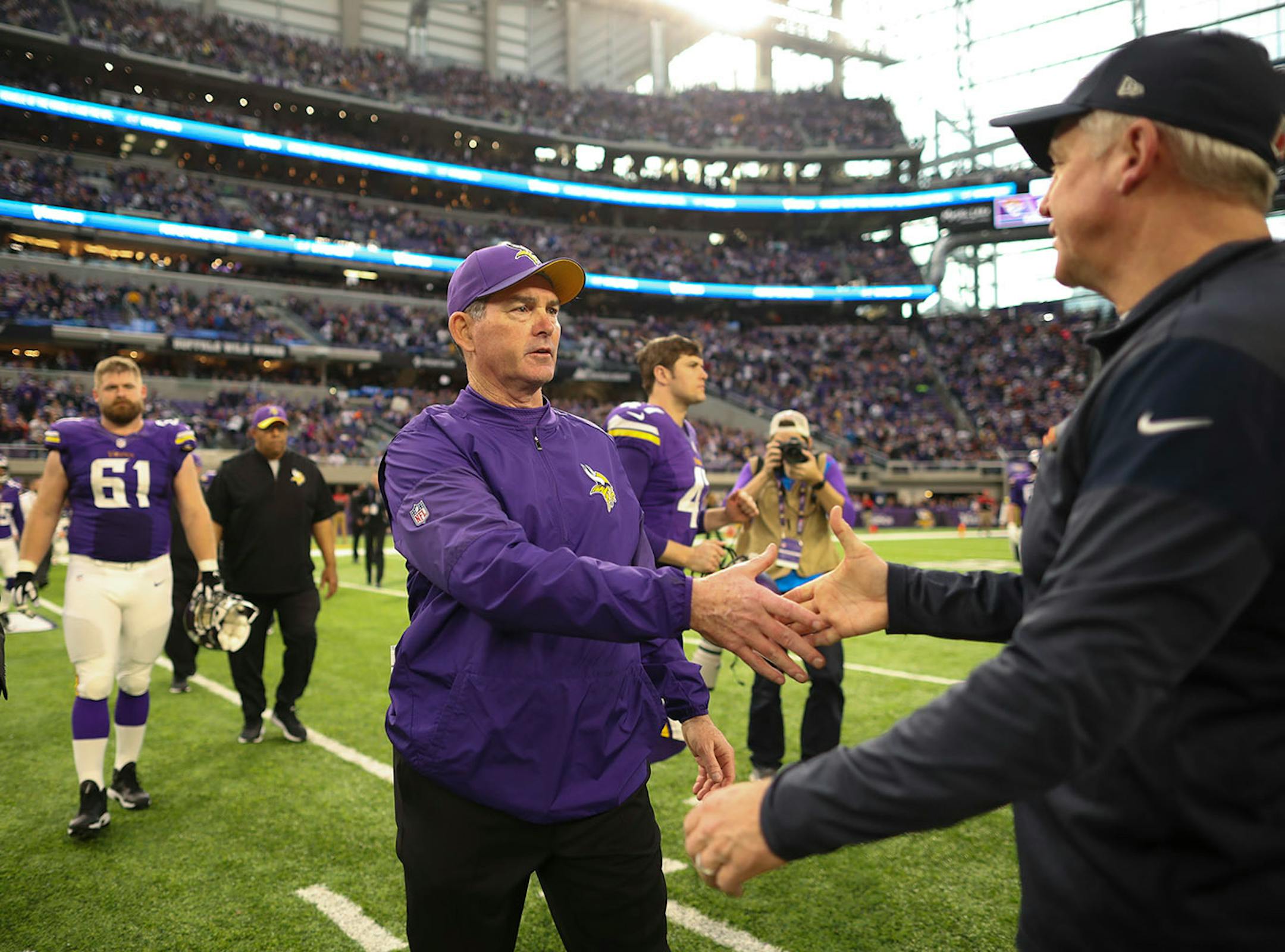Vikings head coach Mike Zimmer shook hands with Chicago Bears head coach John Fox after the Vikings win.