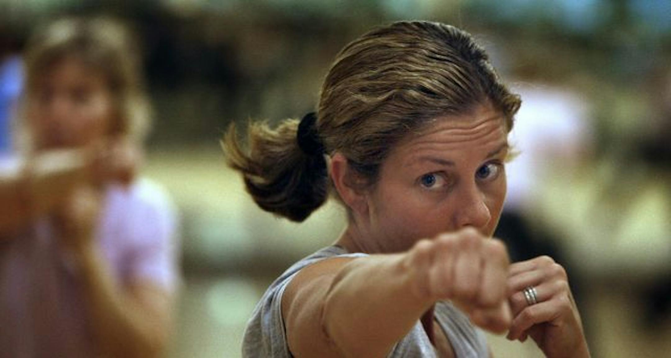 Dawn Hudson concentrated during a mind-body class called IntenSati.