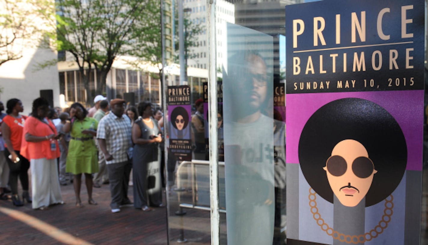 Fans line up outside Royal Farms Arena before Prince's Rally 4 Peace concert in Baltimore. (Jerry Jackson/The Baltimore Sun via AP)