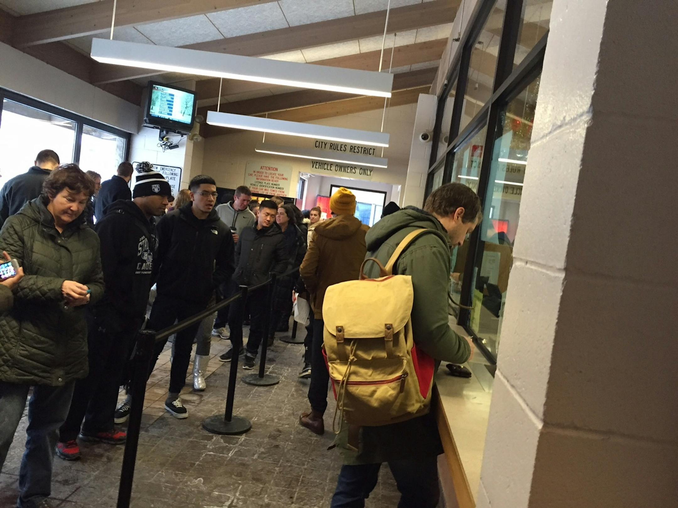 People lined up to claim their vehicles Wednesday morning at the Minneapolis impound lot.