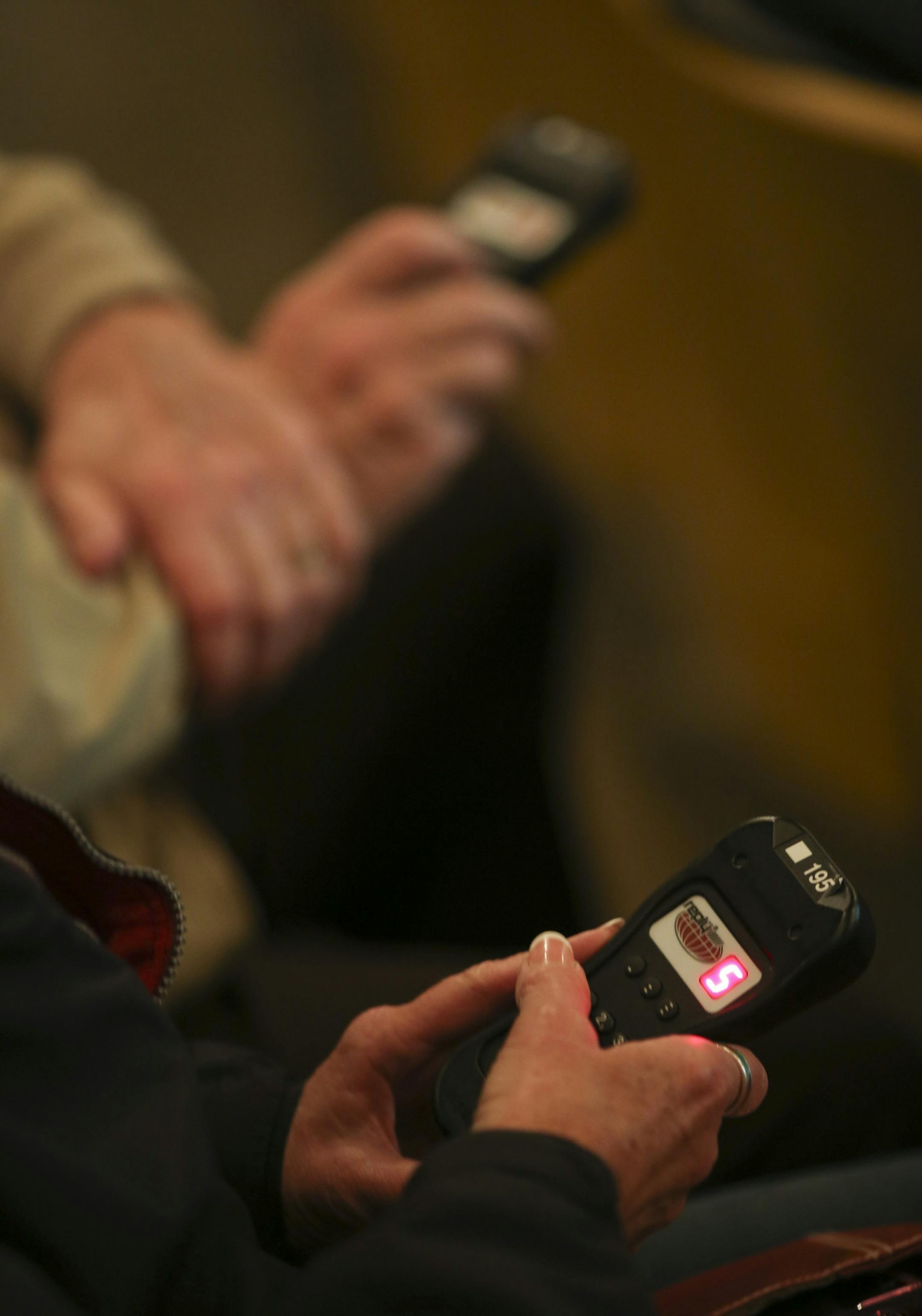 As part of its "Envision Lakeville" process, consultants hired by the city invited people to a series of forums where they can express their opinions on a series of questions about what they want to see in the city's future. Participants used hand held wireless devices to vote on the questions and see real-time results Monday night, March 25, 2013 at Kenwood Trail Middle School. A forum participant expressed her opinion on a topic with a hand held device. ] JEFF WHEELER ‚Ä¢ jeff