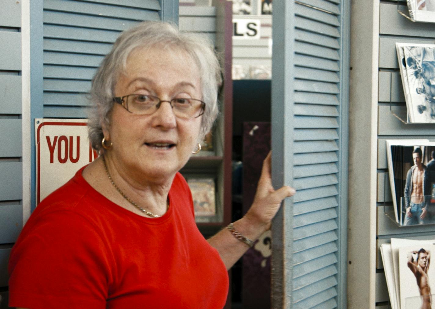 This image released by Netflix shows Karen Mason in a scene from the documentary "Circus of Books," about a Los Angeles gay porn shop that played a vital role in the city's LGBTQ life. The documentary, directed by their daughter Rachel Mason, depicts a Mom and Pop shop unlike any other. It debuts on Wednesday. (Netflix via AP)