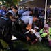 Police arrest pro-Palestinian protesters attempting to camp on Washington University's campus, Saturday, April 27, 2024, in St. Louis, Mo.