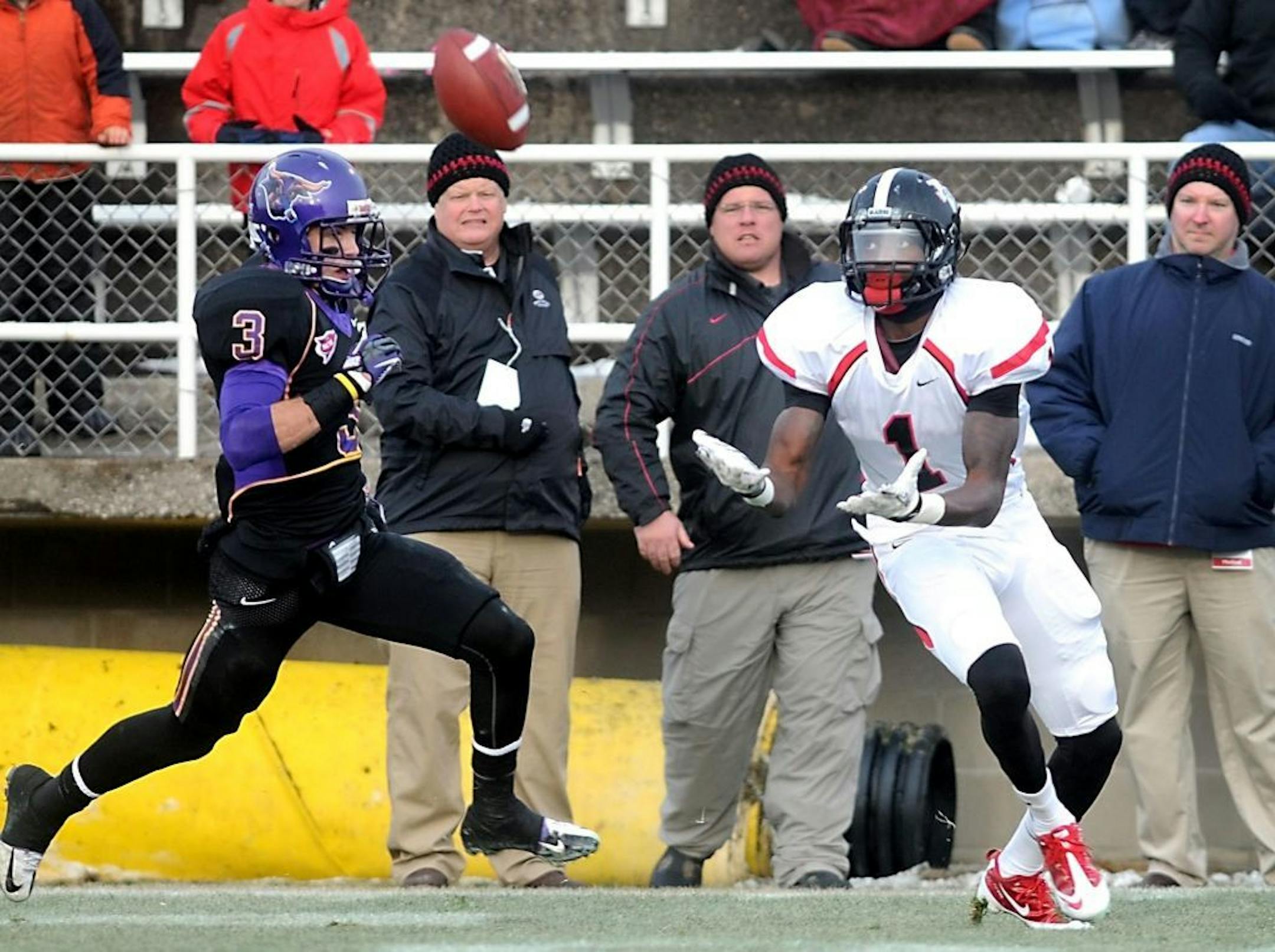 Valdosta State's Seantavious Jones pulls in a pass ahead of Minnesota State, Mankato's Patrick Schmidt.