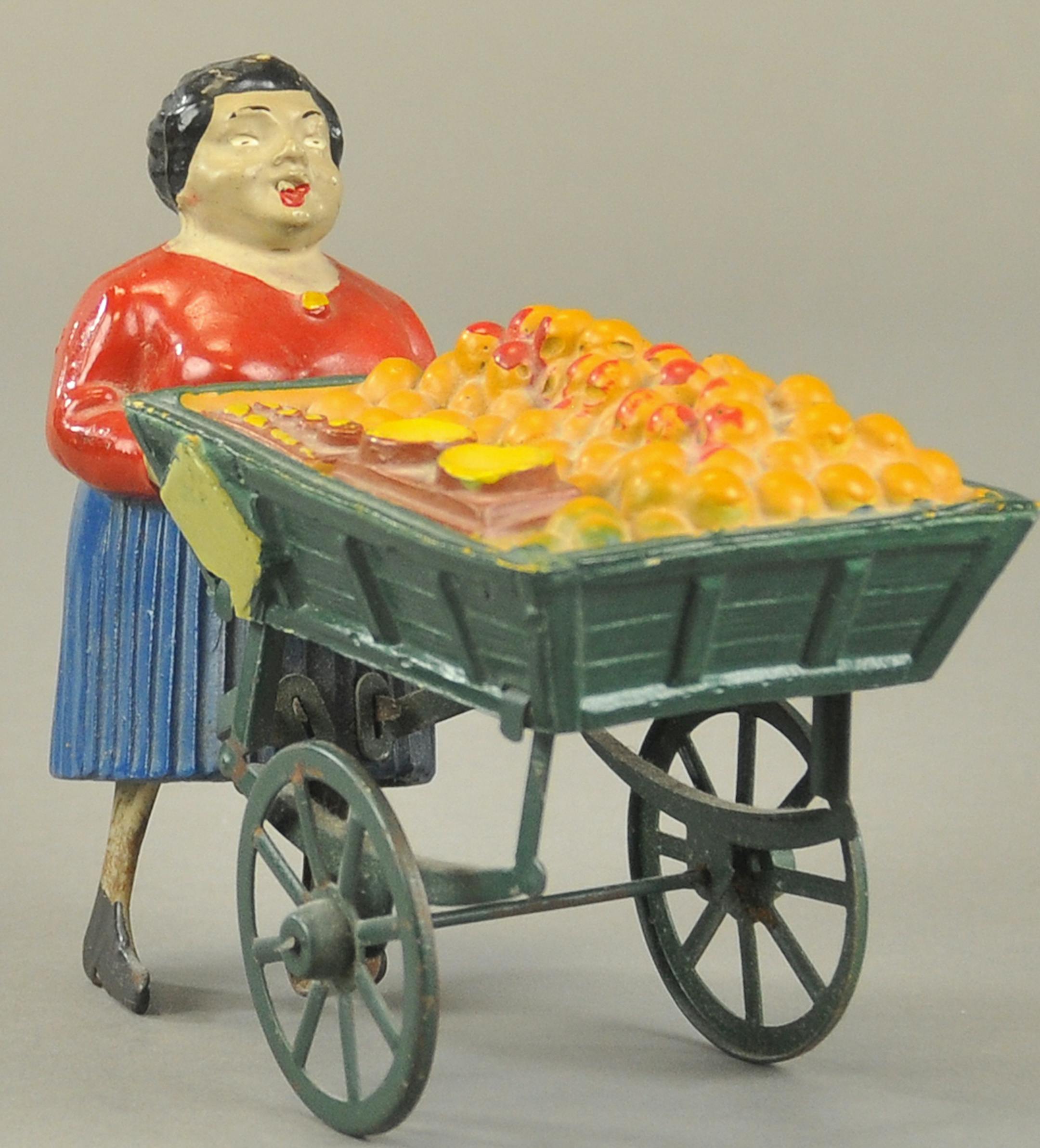 This toy, probably made in France, shows a 6-inch-high 19th-century fruit vendor. A clockwork mechanism makes the woman's legs walk. The rarity of the toy and its almost perfect paint encouraged a bidder to buy it for $339 in September 2014 at a Bertoia auction in Vineland, N.J. (c) 2015 by Cowles Syndicate Inc.