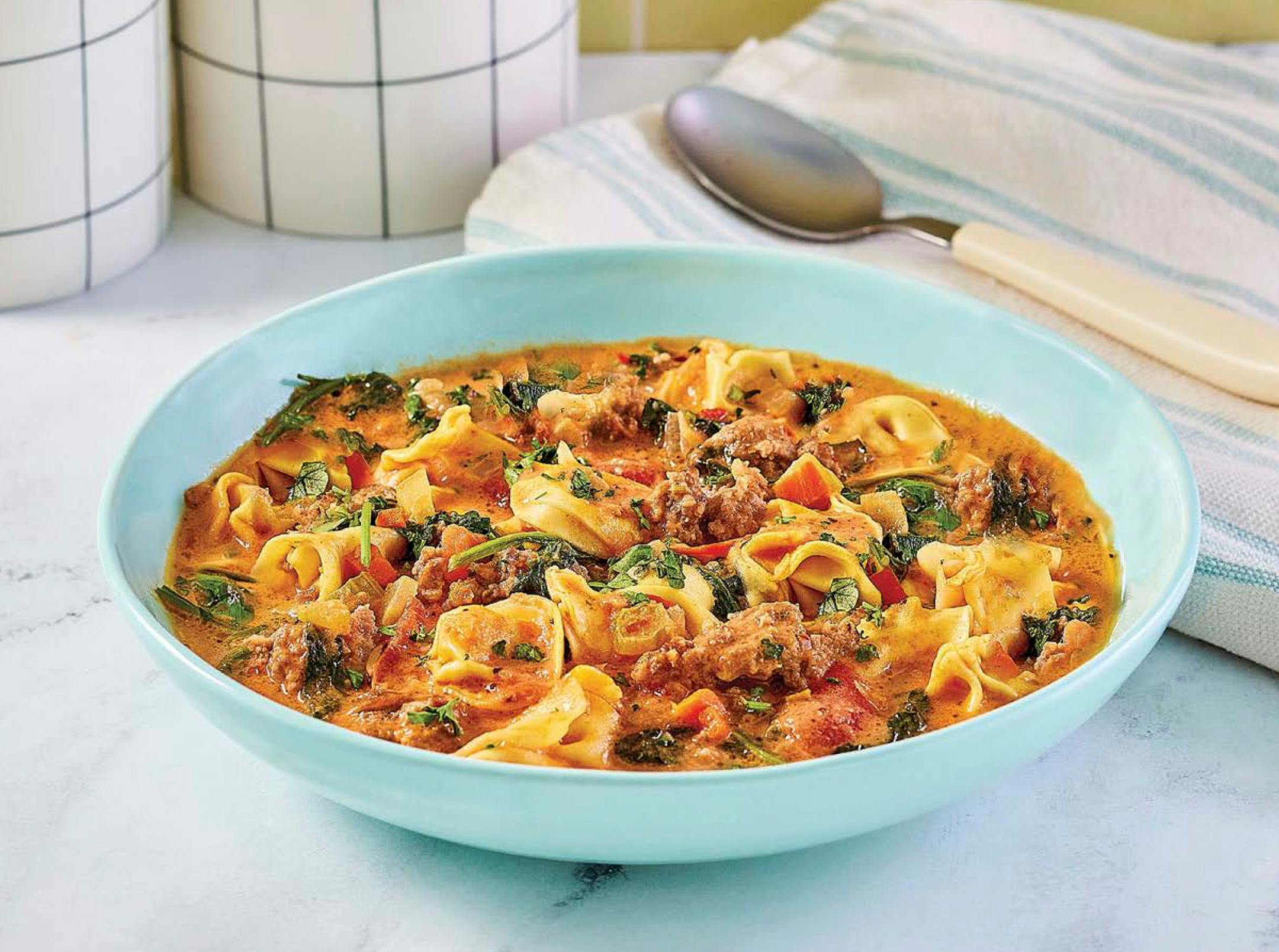 Tortellini Soup with Sausage and Spinach From "The Everything One Pot Mediterranean Cookbook," by Peter Minaki (Simon &amp; Schuster, 2023).Credit: James Stefiuk
