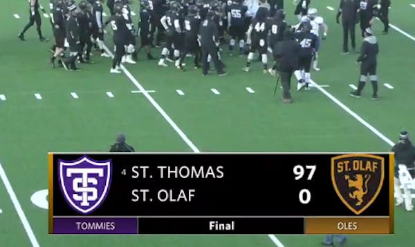 Running (and passing) it up: St. Thomas clobbers St. Olaf 97-0