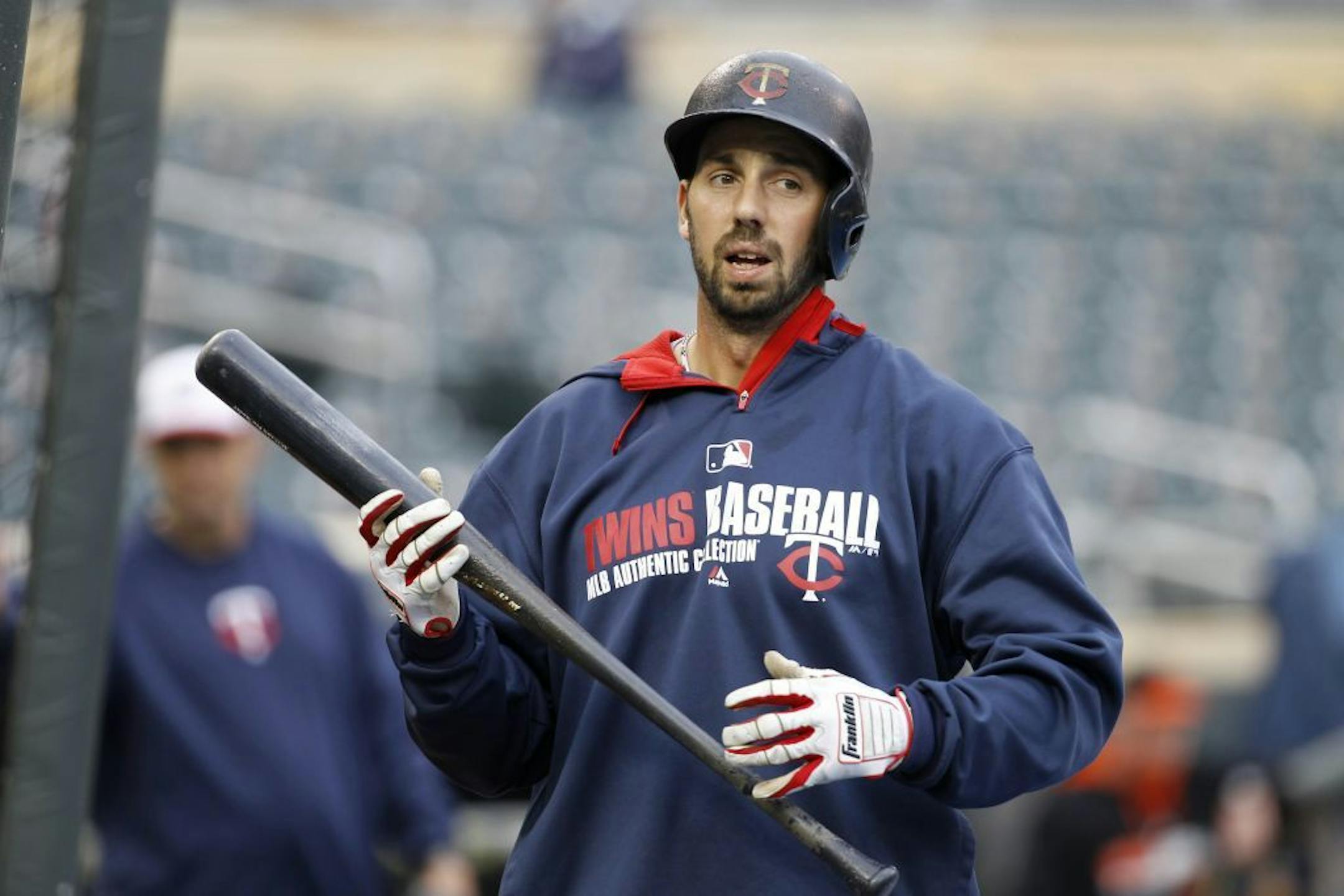 Minnesota Twins right fielder Chris Colabello takes part in batting practice before a baseball game against the Baltimore Orioles in Minneapolis, Friday, May 2, 2014.
