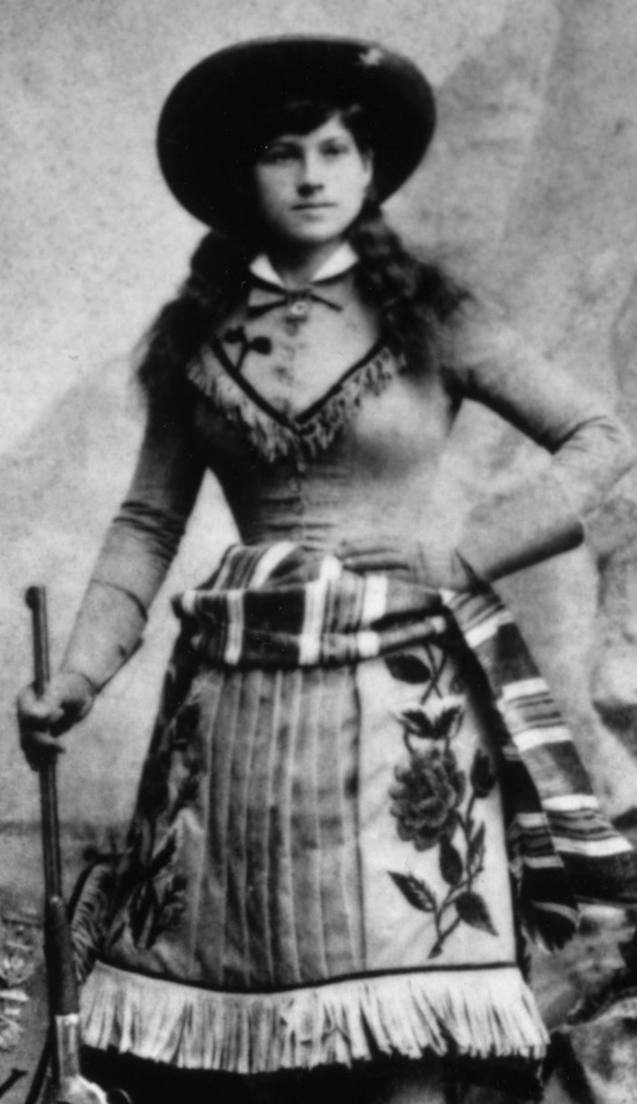 Annie Oakley, crack shot with a rifle, and an American folk hero. Historical photo courtesy of Culver Pictures, via A&E Biography (television).