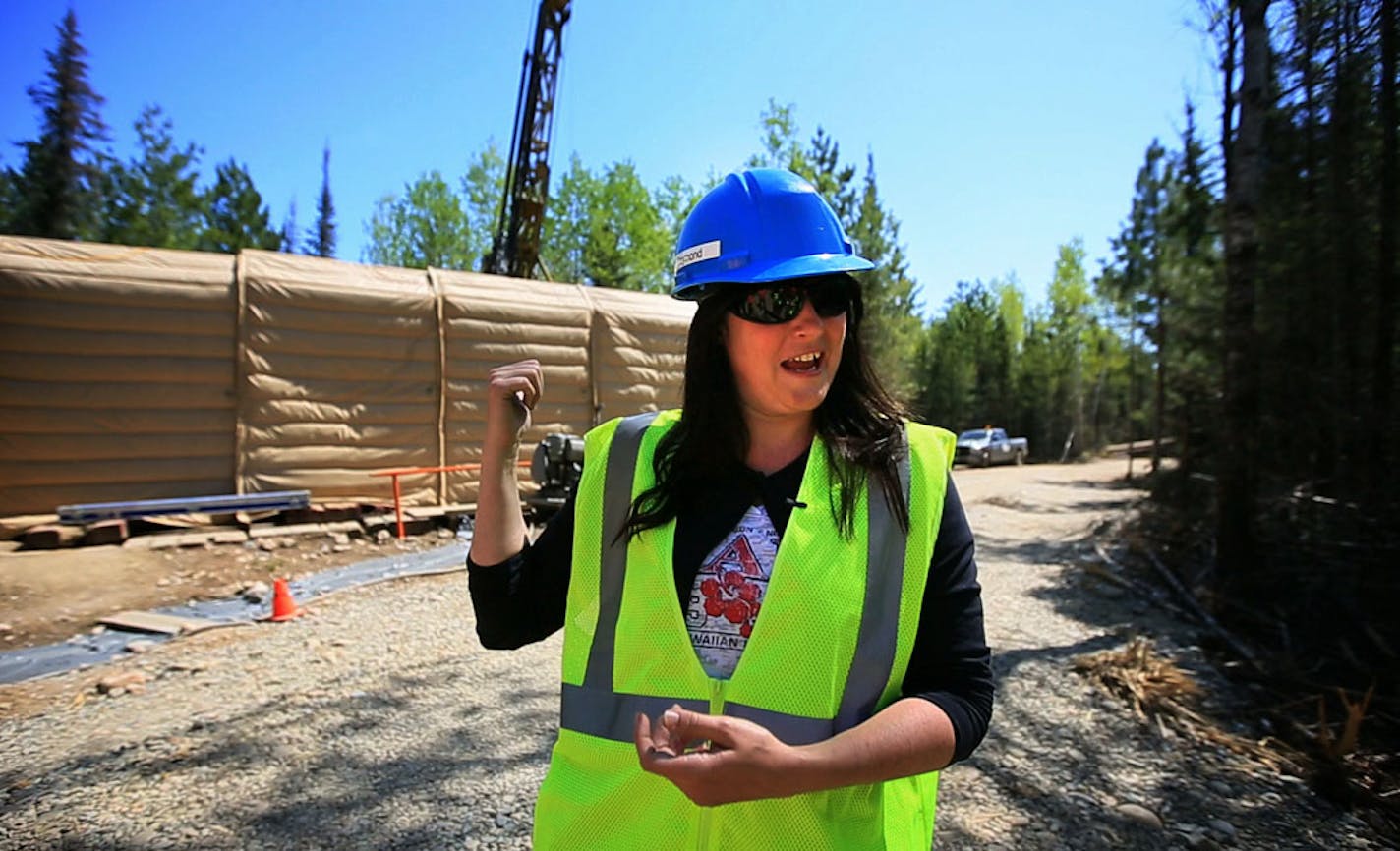 Twin Metals geologist Gina Raymond, explains the process of drilling in the area near the Kawishiwi River.