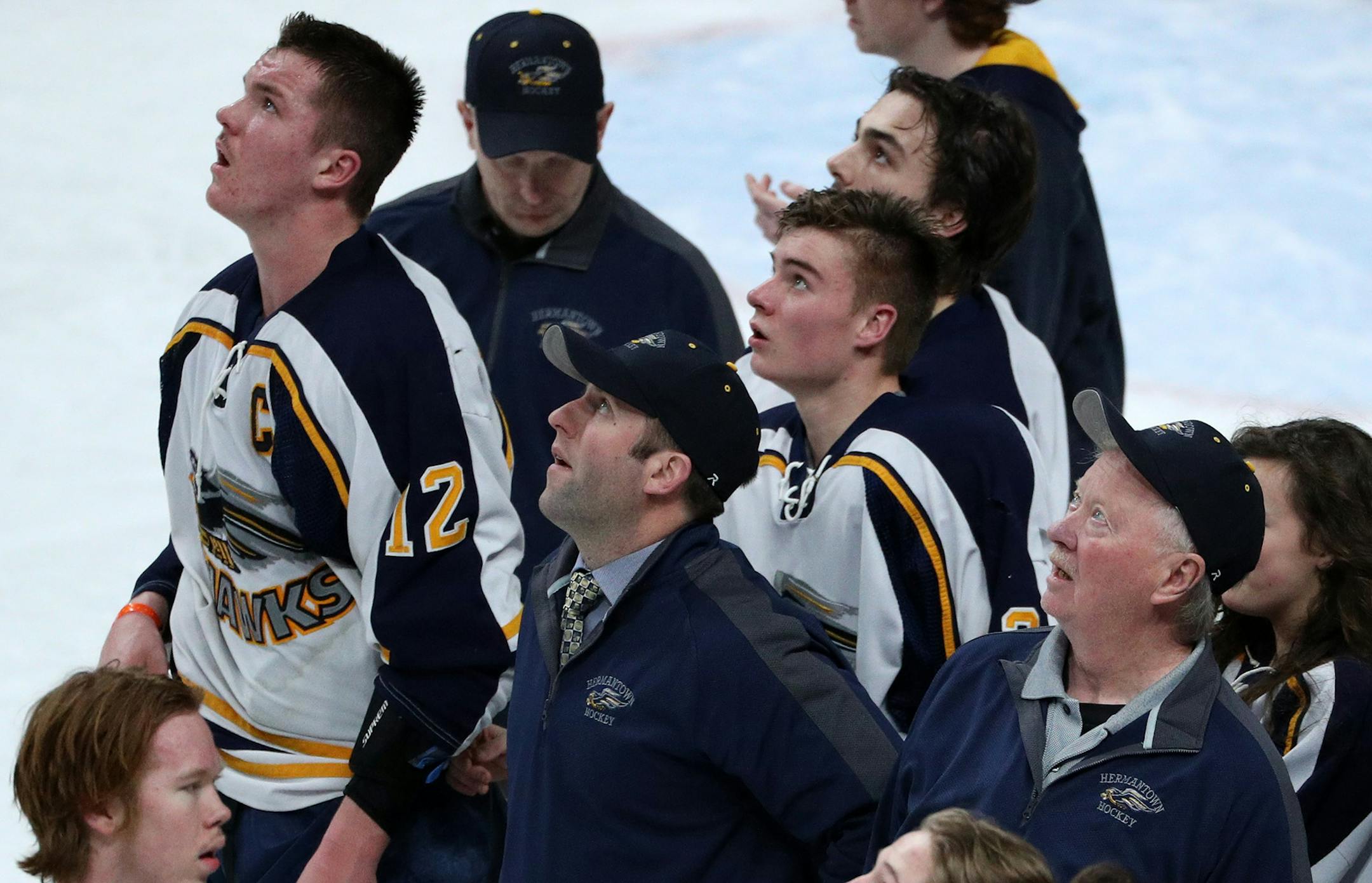 Hermantown players and coaches watched on the ice as a goal scored in overtime went under review. The goal was waved off. ] ANTHONY SOUFFLE &#xef; anthony.souffle@startribune.com Players competed during the boys' hockey state tournament Class 1A championship game Saturday, March 11, 2017 at the Xcel Energy Center in St. Paul, Minn.