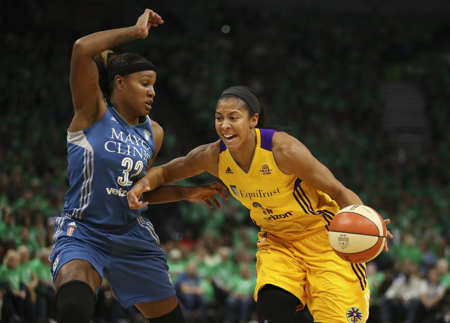 Los Angeles Sparks forward Candace Parker (3) drove the hoop in the first half while defended by Minnesota Lynx forward Rebekkah Brunson (32). She was named the series MVP.