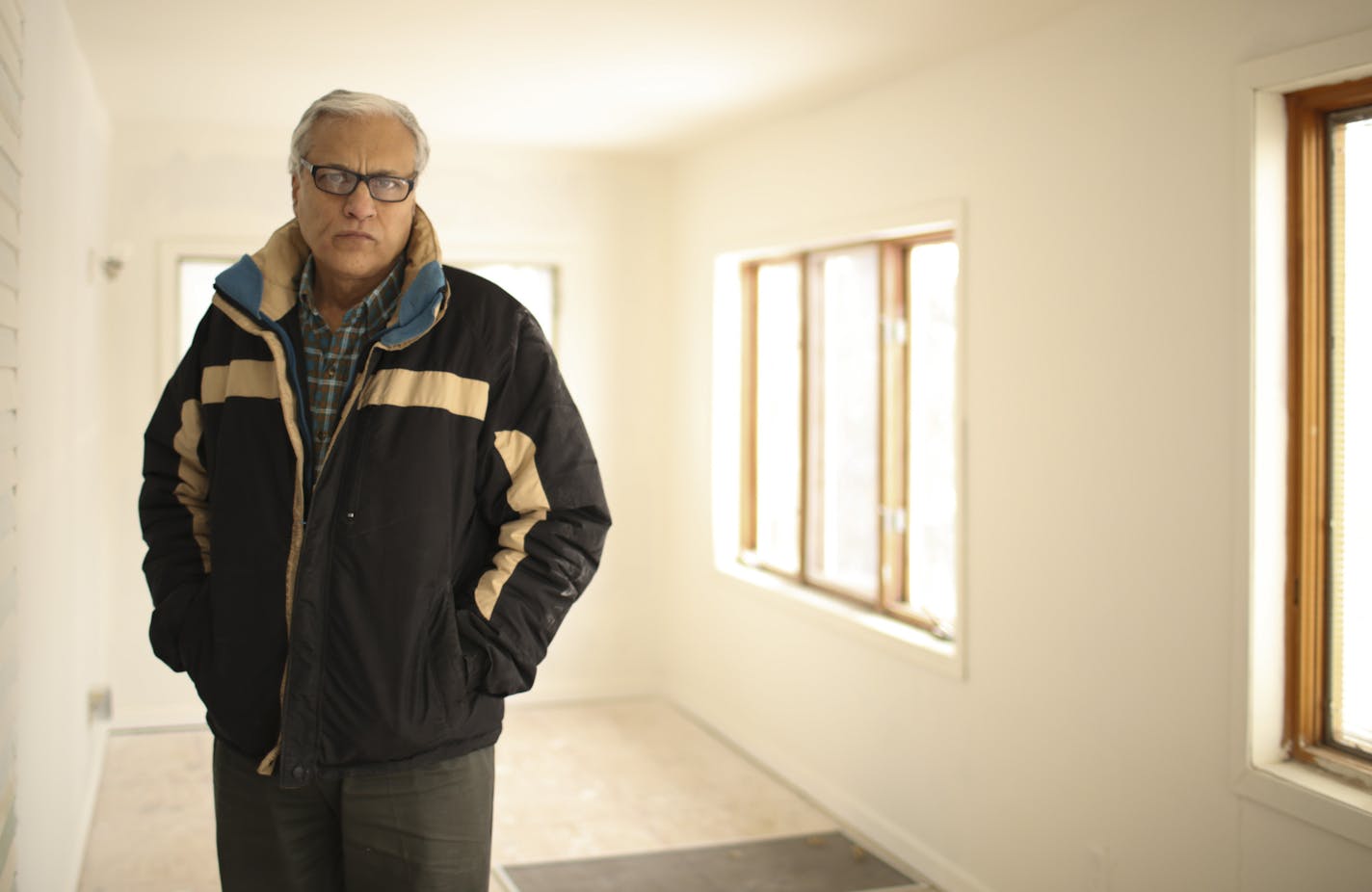 Mahmoud Khan in one of his former rental properties in north Minneapolis Monday afternoon. ] JEFF WHEELER &#x2022; jeff.wheeler@startribune.com Landlord Mahmoud Khan, who owns dozens of properties on the North Side, may finally lose his licenses after years of sparring with the city. Mahmoud Khan showed a couple of his properties Monday afternoon, February 16, 2015 that he says illustrate the dispute he is having with the city of Minneapolis.