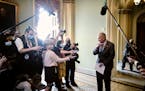 Senate Majority Leader Chuck Schumer, D-N.Y., speaks to reporters about the infrastructure deal on July 28 at the Capitol in Washington.
