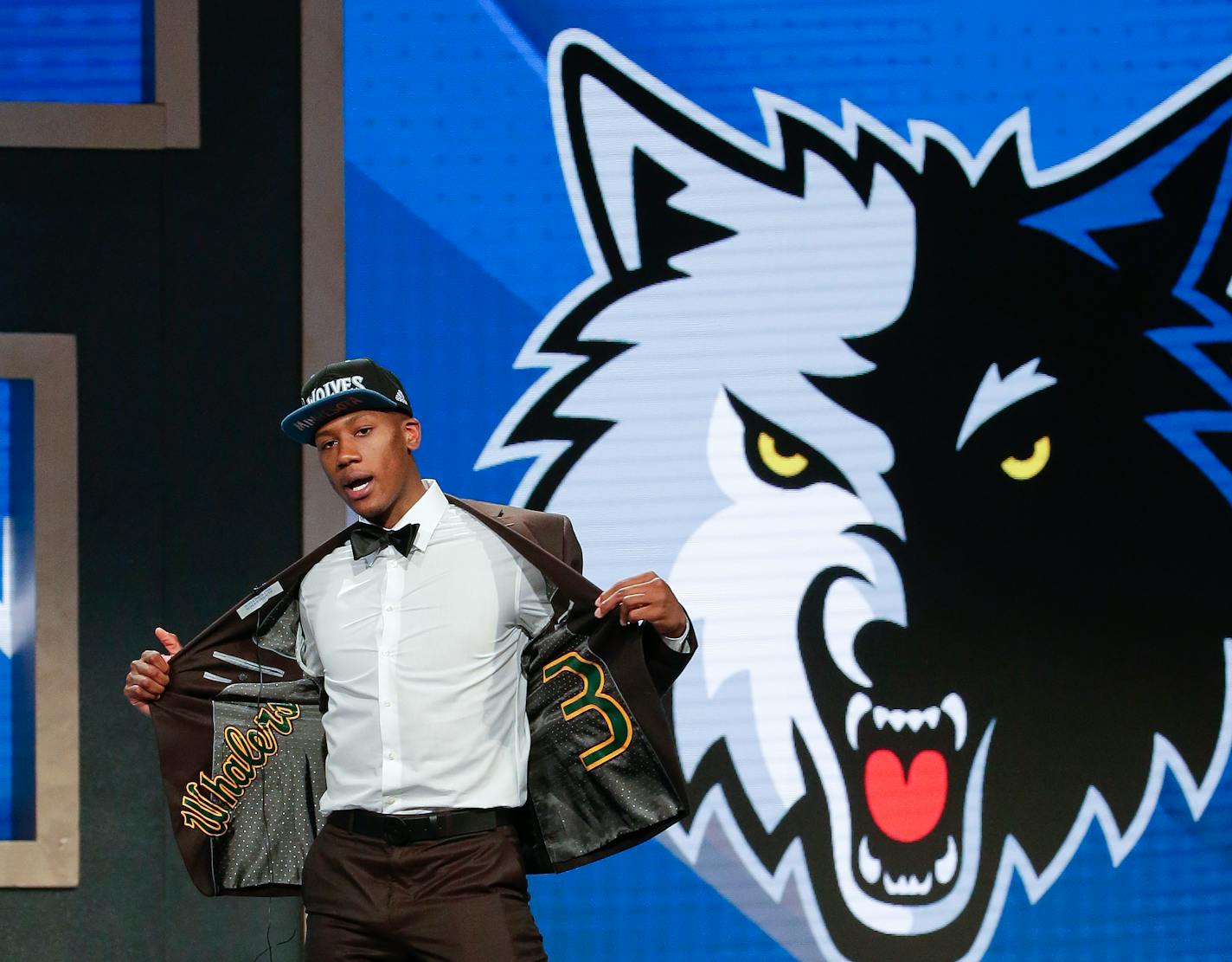 Kris Dunn reacts as he steps up on stage after being selected fifth overall by the Minnesota Timberwolves during the NBA basketball draft, Thursday, June 23, 2016, in New York. (AP Photo/Frank Franklin II)