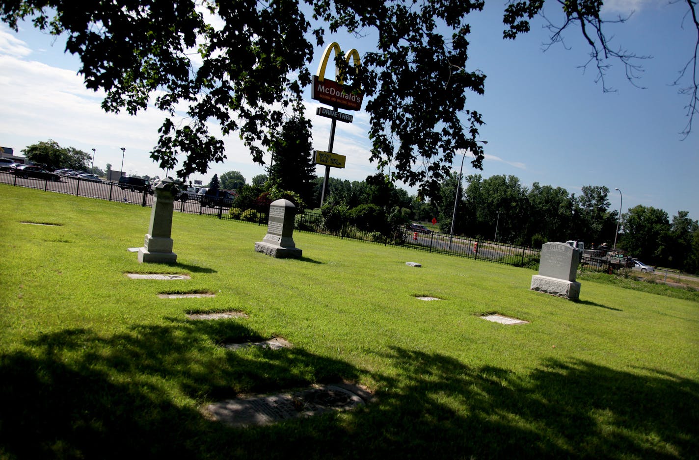 ELIZABETH FLORES &#x2022; eflores@startribune.com July 20, 2010 - Cottage Grove, MN - Atkinson Cemetery. IN THIS PHOTO:] It is evident that the Atkinson Cemetery has been well taken care of as it is fenced in between Cottage Grove businesss'.