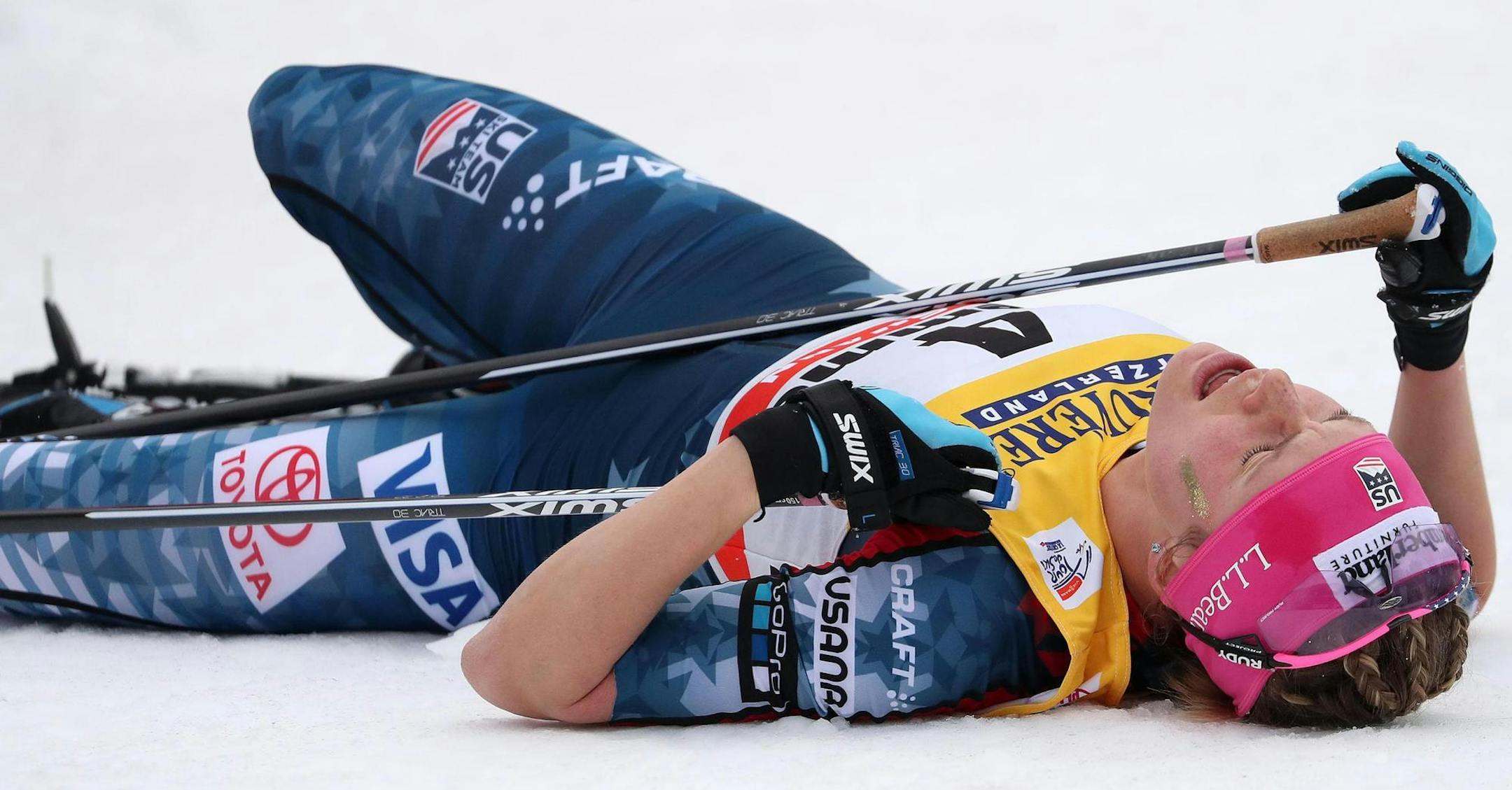 After a climb on skis up Alpe Cermis in Italy, Afton's Jessie Diggins fell to the snow and gasped for breath.