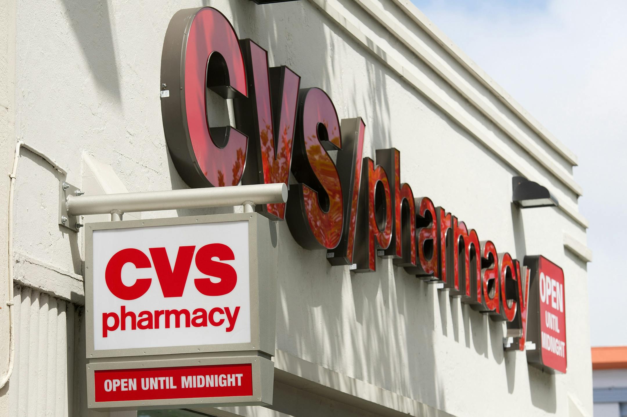 CVS Caremark Corp. signage is seen on the facade of a store in San Francisco, California, U.S., on Wednesday, Aug. 3, 2011. CVS Caremark Corp., the largest provider of prescription drugs in the U.S., is expected to announce earnings on Aug. 4. Photographer: David Paul Morris/Bloomberg