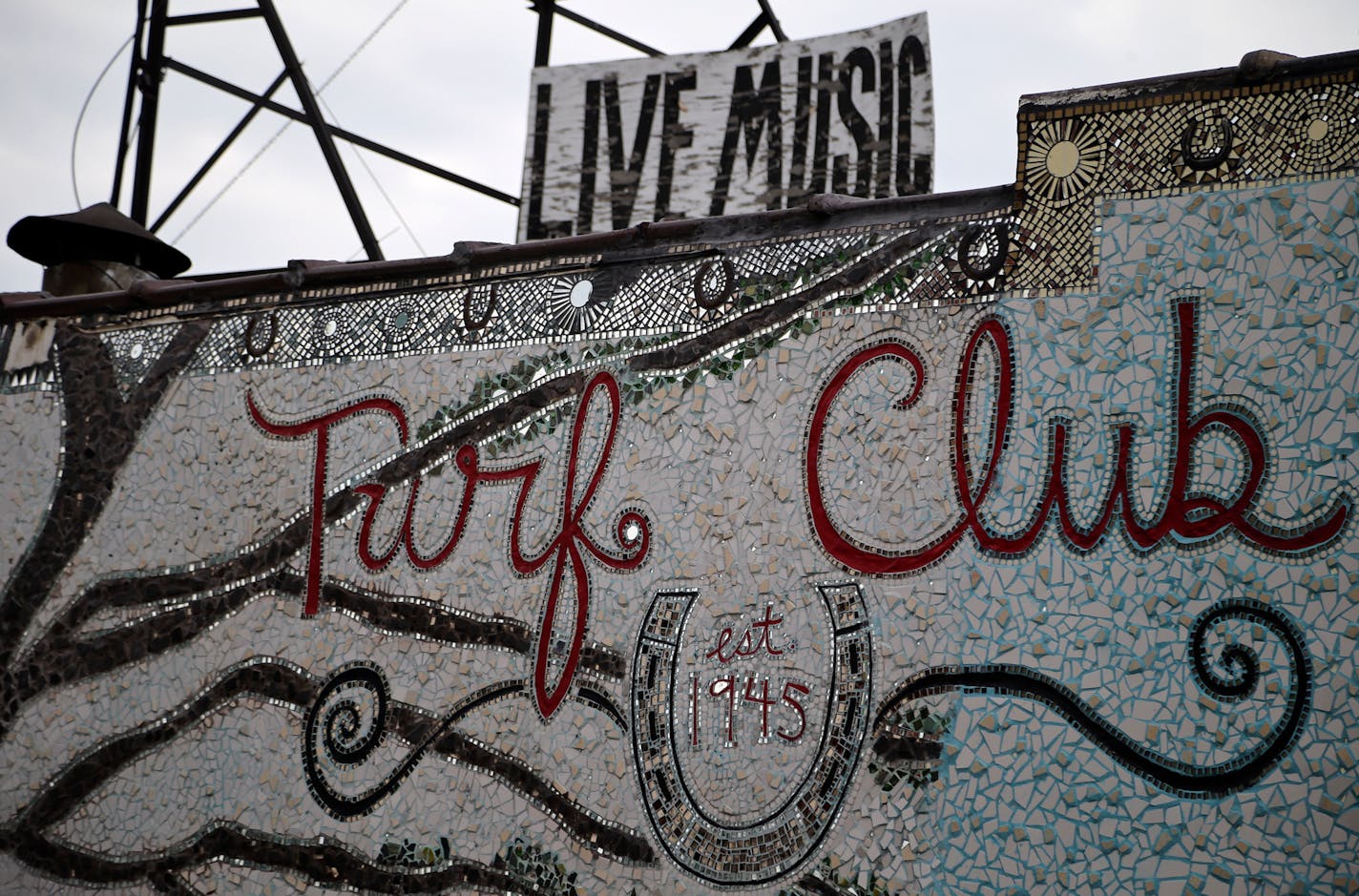 A mosaic mural is visible on the side of the Turf Club Friday, Oct. 11, 2013, in St. Paul, MN.] (DAVID JOLES/STARTRIBUNE) djoles@startribune.com First Avenue nightclub announced plans to buy St. Paul's most beloved rock venue, the Turf Club. ORG XMIT: MIN1310111544354687