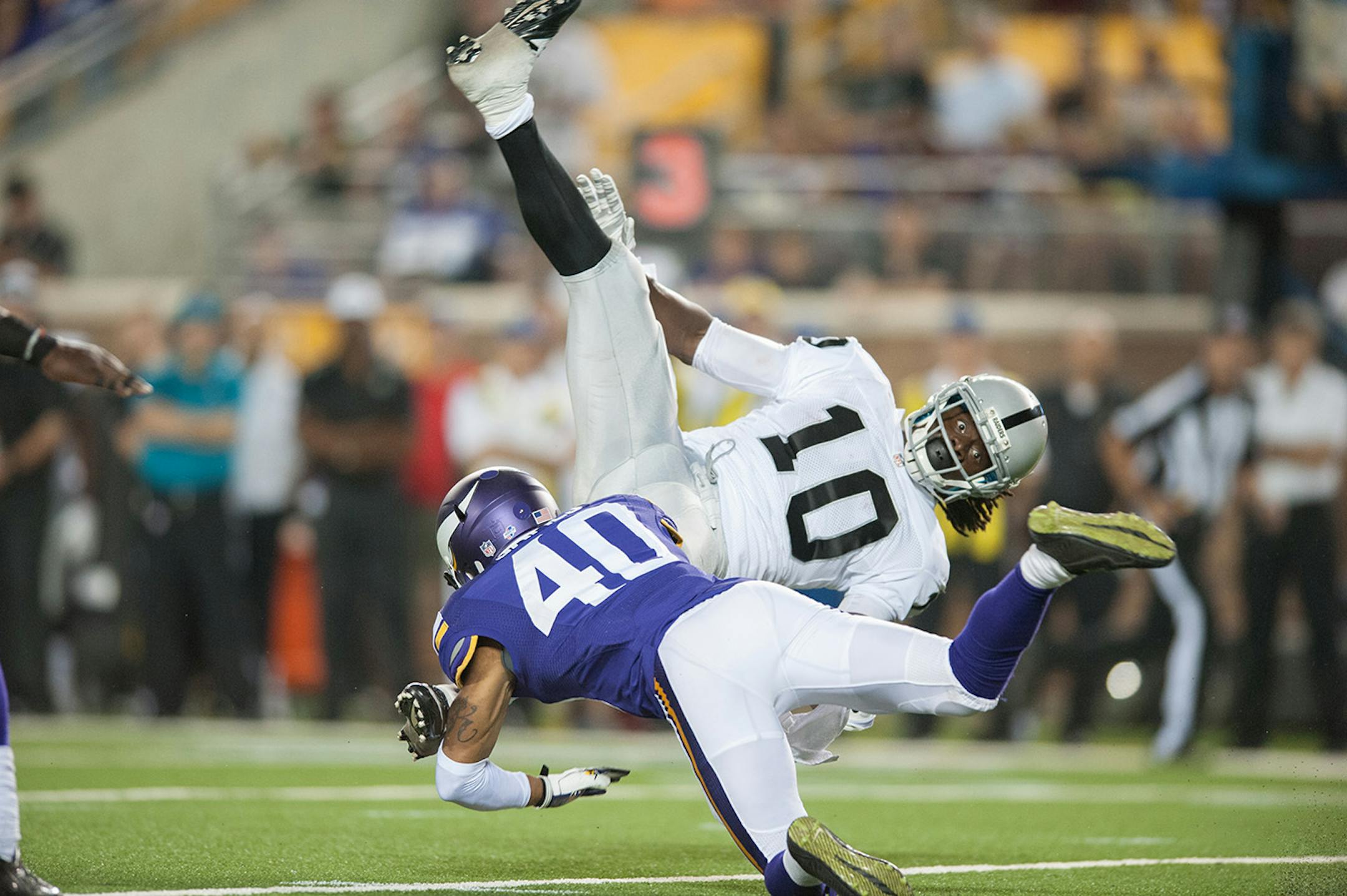 [VIKE080914 * 20035696A * 523370 * Mark Vancleave/MARK.VANCLEAVE@STARTRIBUNE.COM * Vikings vs. Oakland Raiders, Aug. 8, 2014 at TCF Bank Stadium.] Vikings corner back Kendall James tackles Oakland wide reciever Greg Jenkins in the fourth quarter.