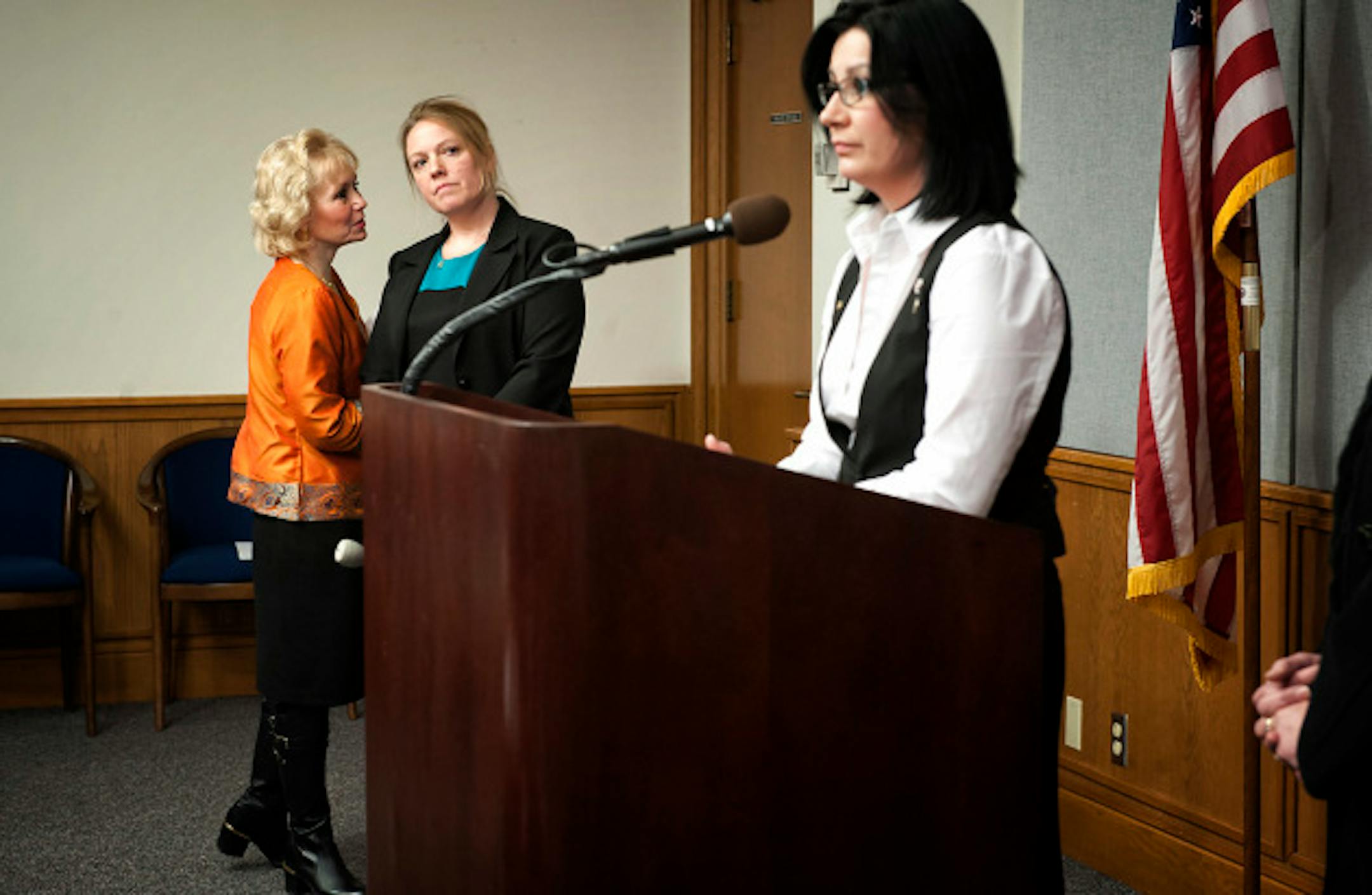 Jennifer Munt, director of public policy for AFSCME and Lisa Thompson, president of local 340 CCPT watched as Rep Mary Franson, a former daycare provider herself, said daycare providers didn't want a union Monday, February 25, 2013,  Munt and Thompson spoke earlier at a press conference to support the Child Care Collective bargaining Act, introduced today.    ]   GLEN STUBBE * gstubbe@startribune.com