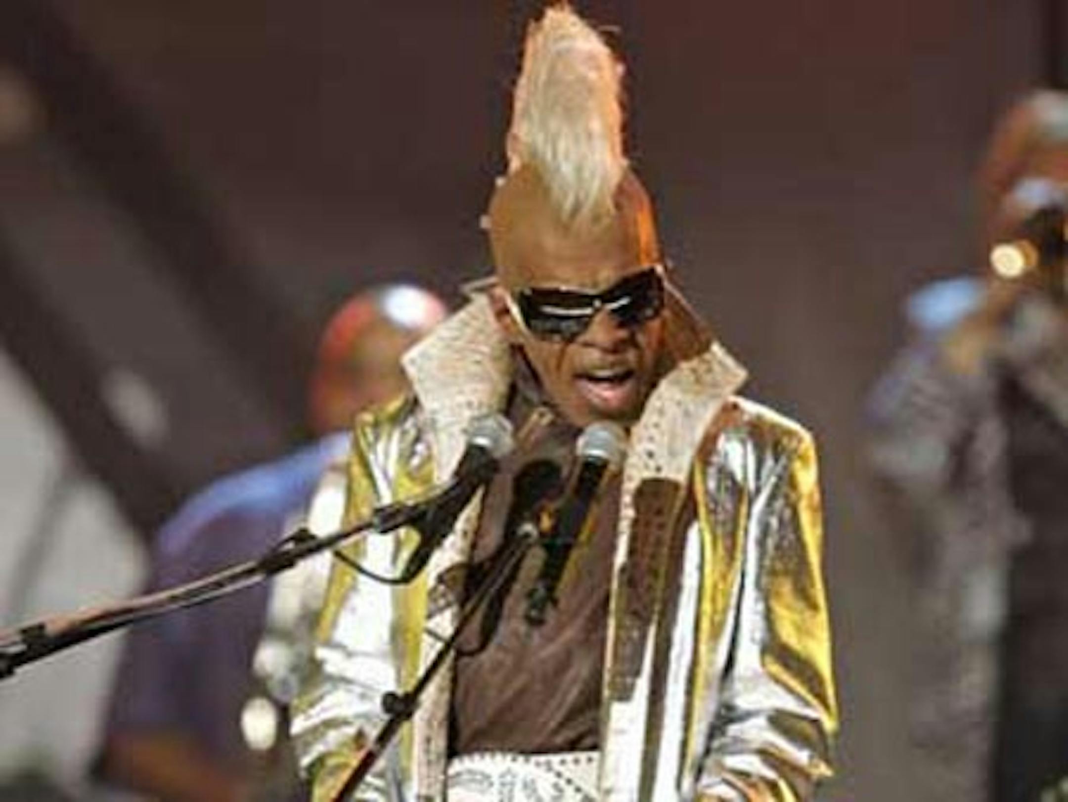 Sly Stone from the group Sly and the Family Stone performs at the 48th Annual Grammy Awards on Wednesday, Feb. 8, 2006, in Los Angeles. (AP Photo/Mark J. Terrill)
