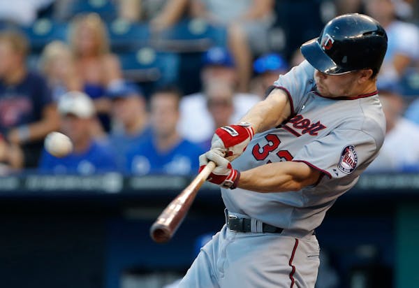 The Twins' Justin Morneau hit a two-run home run off Royals starter James Shields during the first inning Tuesday.