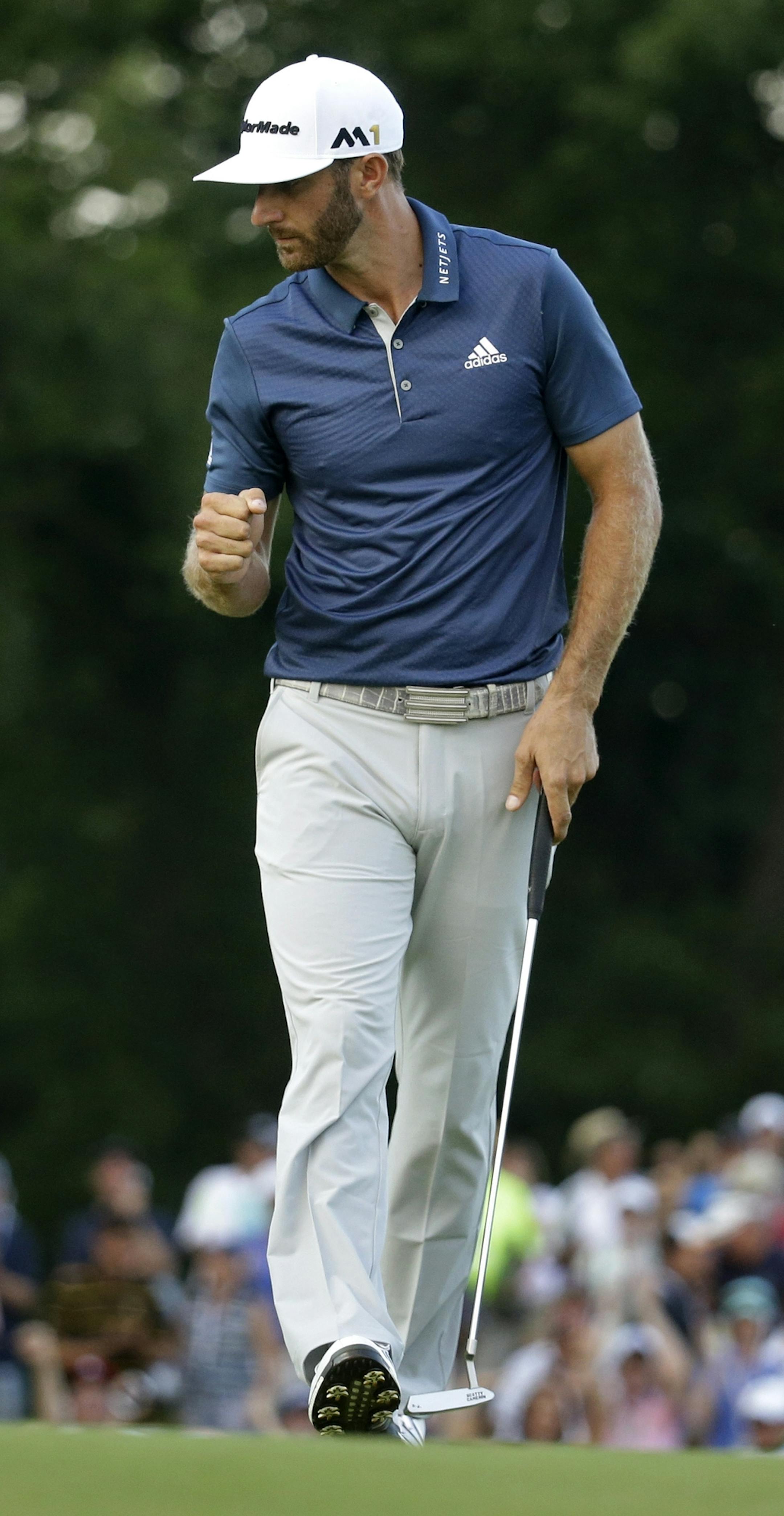 Dustin Johnson celebrates on the 15th hole during the final round of the U.S. Open golf championship at Oakmont Country Club on Sunday, June 19, 2016, in Oakmont, Pa. (AP Photo/John Minchillo)