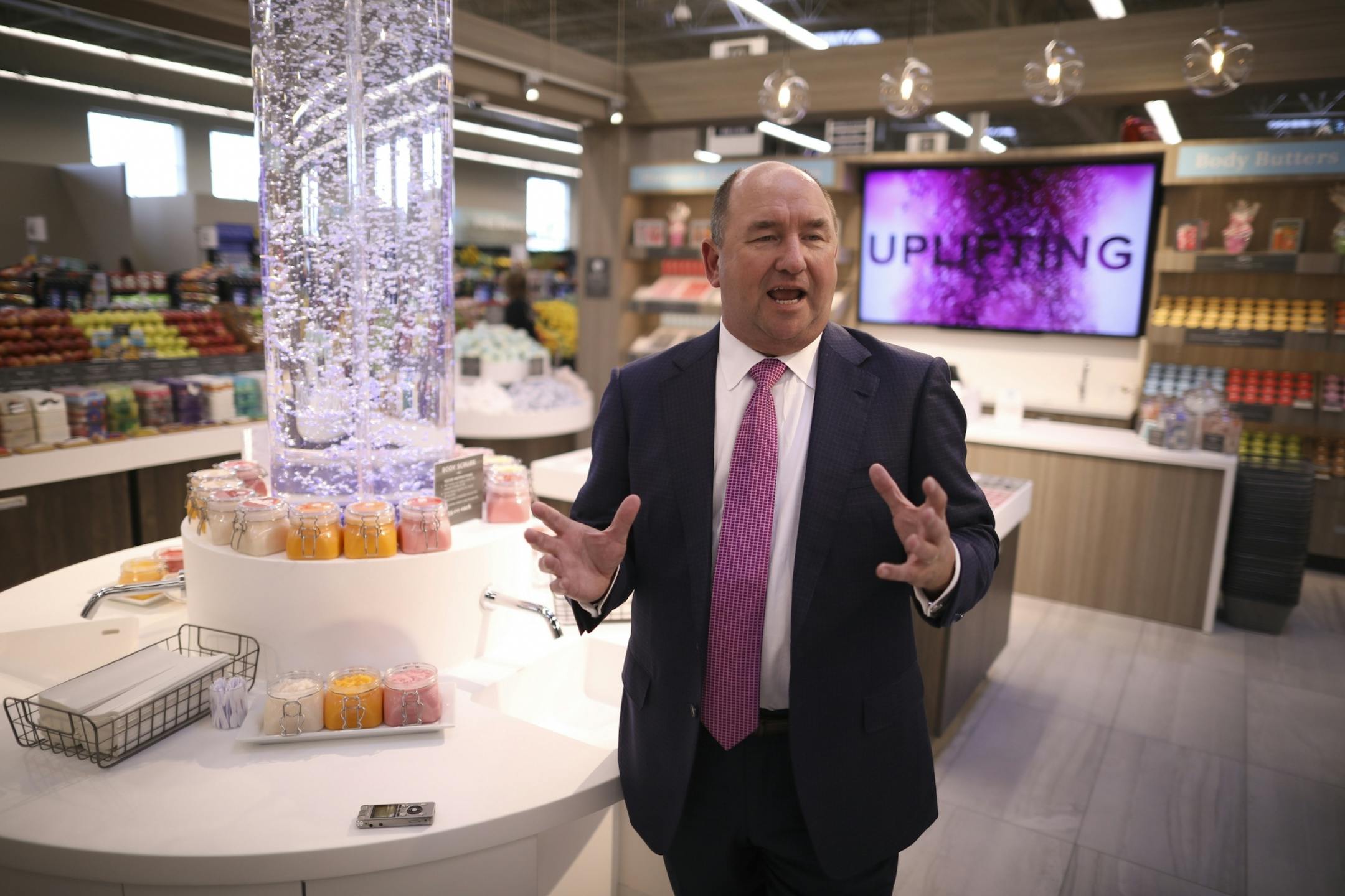 Hy-Vee's President and CEO Randy Edeker in the natural bath products section of the new Cottage Grove store Monday afternoon.