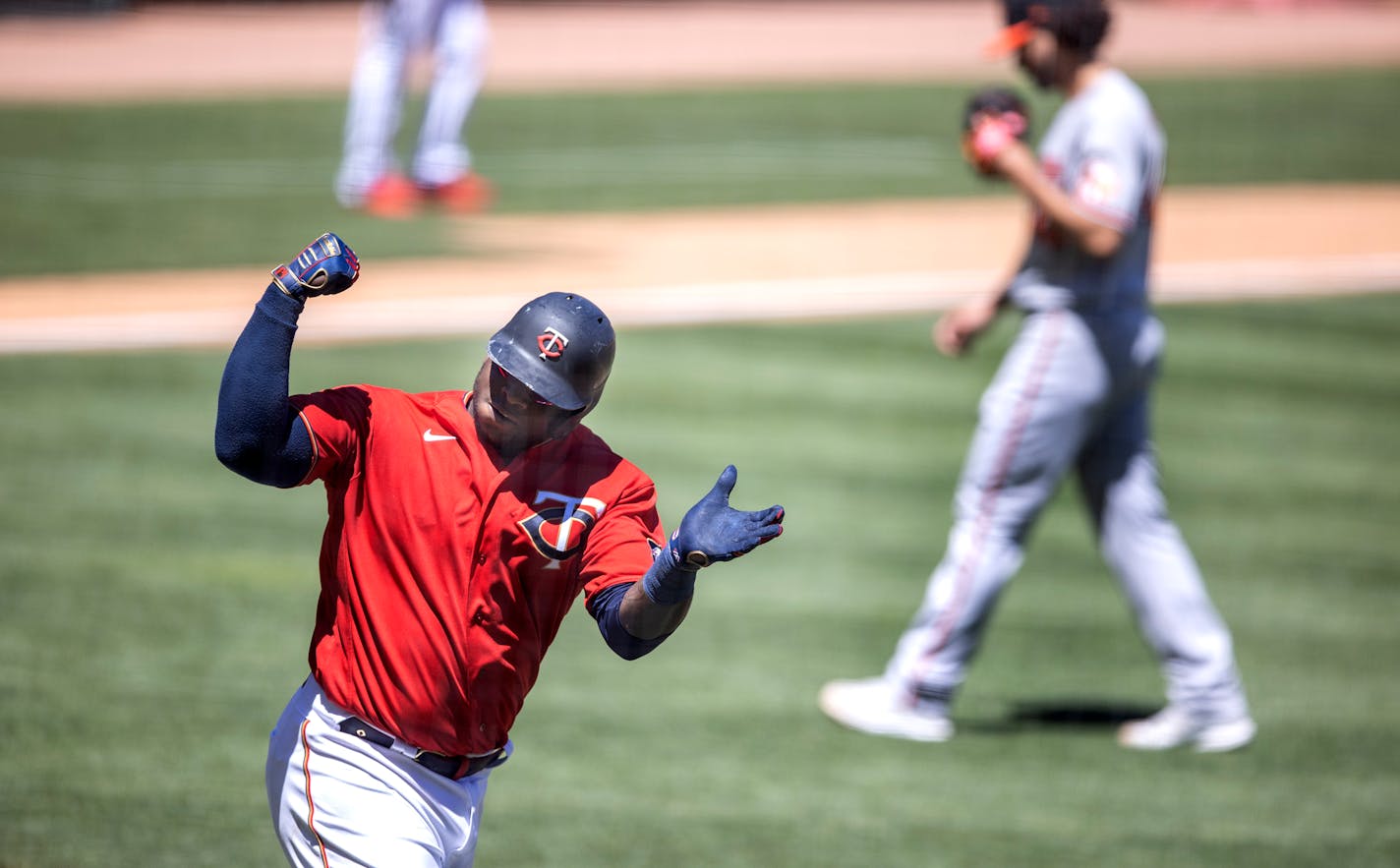 Minnesota Twins first baseman Miguel Sano (22) celebrated his 3 run homer in the sixth inning over Baltimore Orioles relief pitcher Jorge Lopez (48). ] Jerry Holt •Jerry.Holt@startribune.com