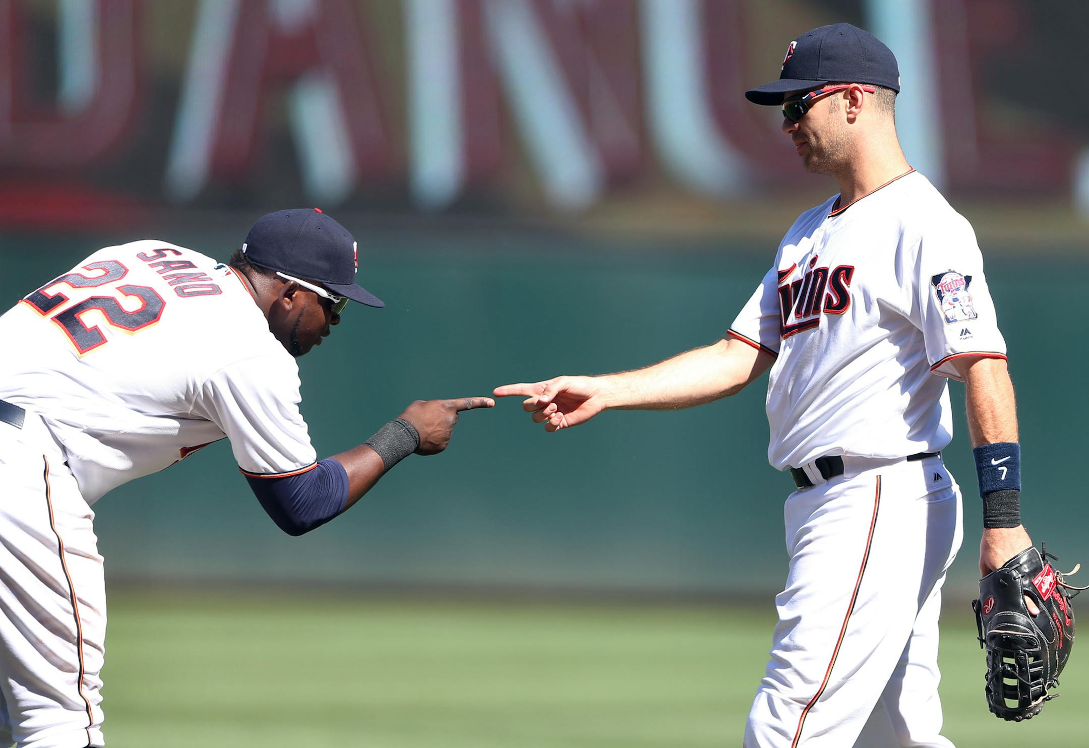 Minnesota Twins Miguel Sano (22) left and Minnesota Twins first baseman Joe Mauer (7) celebrated a win at Target Field Sunday July 3, 2016 in Minneapolis , MN.] The Minnesota Twins beat the the Texas Rangers 5-4. Jerry Holt /Jerry.Holt@Startribune.com