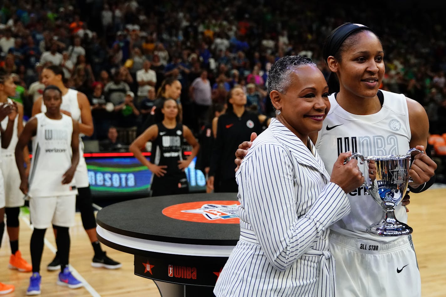 Team Parker forward Maya Moore posed for a photo with WNBA league president Lisa Michelle Borders