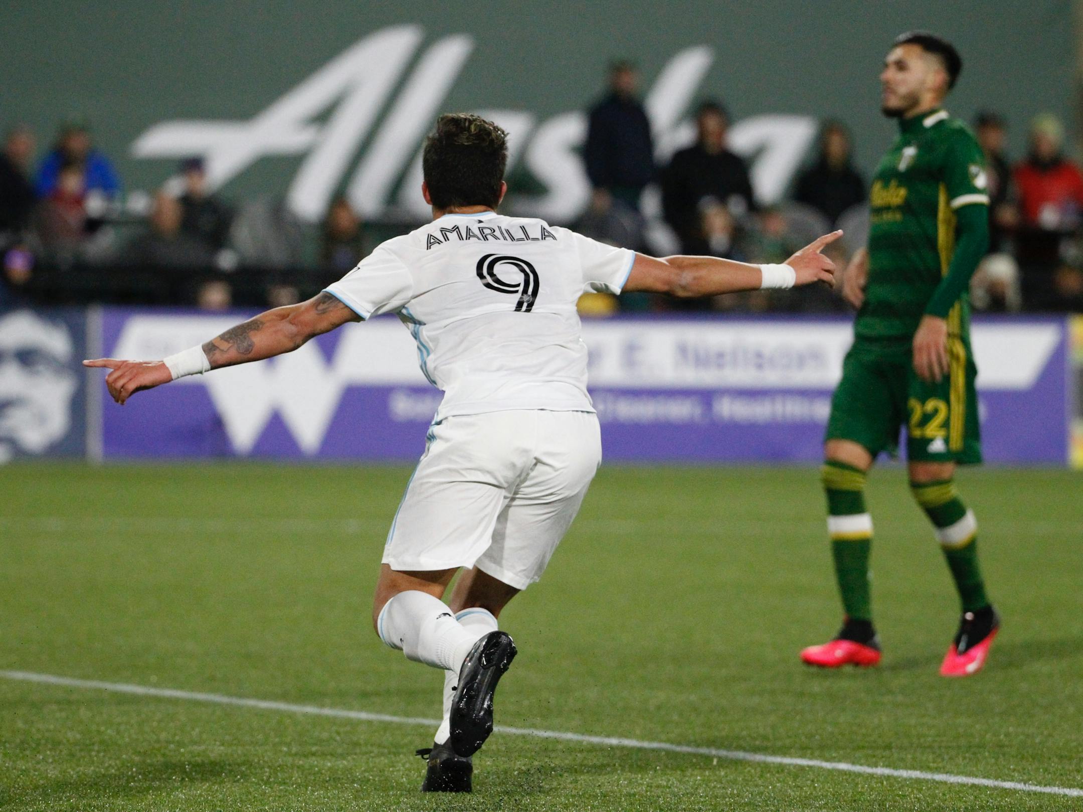 Minnesota United forward Luis Amarilla celebrated his go-ahead goal in the 76th minute of the Loons' 3-1 season-opening victory over Portland on Sunday.