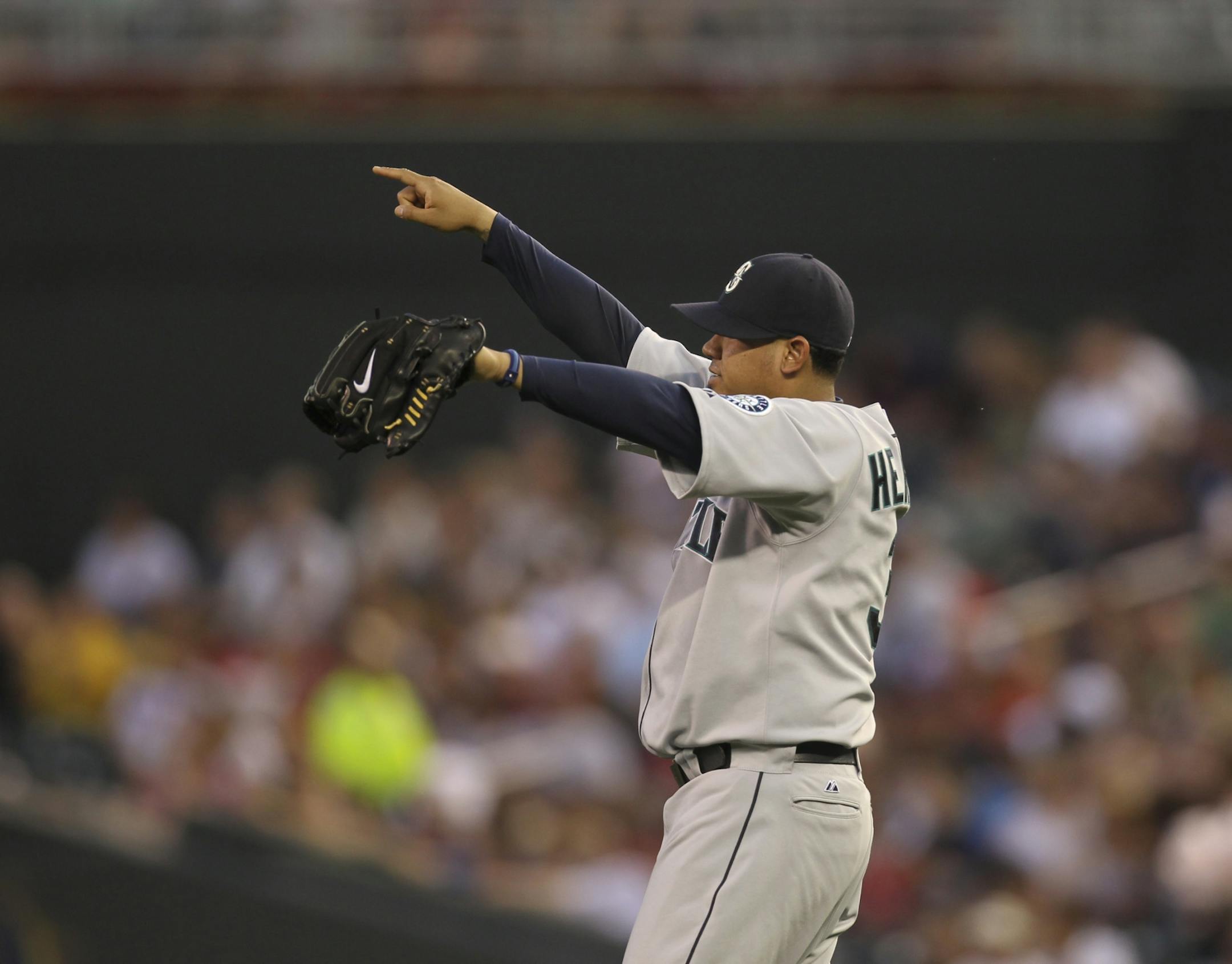 The Minnesota Twins began a series with the Seattle Mariners Monday night, August 27, 2012, at Target Field in Minneapolis, Minn. Seattle starter Felix Hernandez acknowledged center fielder Franklin Gutierrez after he caught a deep fly by the Twins' Trevor Plouffe in the third inning Monday night.