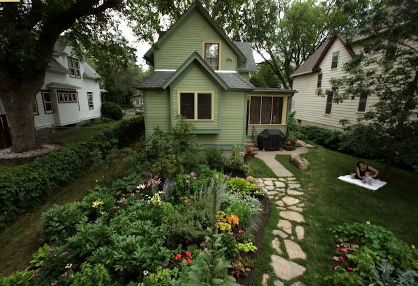 The back-yard garden of Jennifer Baldwin Peden and Tom Peden has been a joint production.