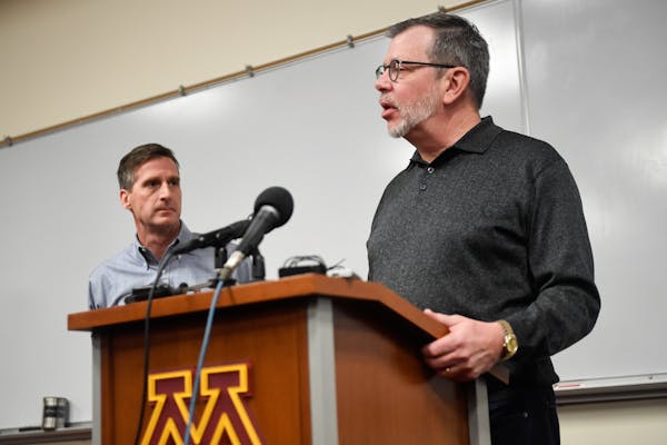 University of Minnesota President Eric Kaler, right, and athletic director Mark Coyle have been behind some big-ticket decisions that shows the school