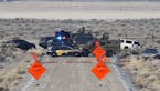 Law enforcement personnel block an access road to the Malheur National Wildlife Refuge, Wednesday, Jan. 27, 2016, near Burns, Ore. Authorities were re